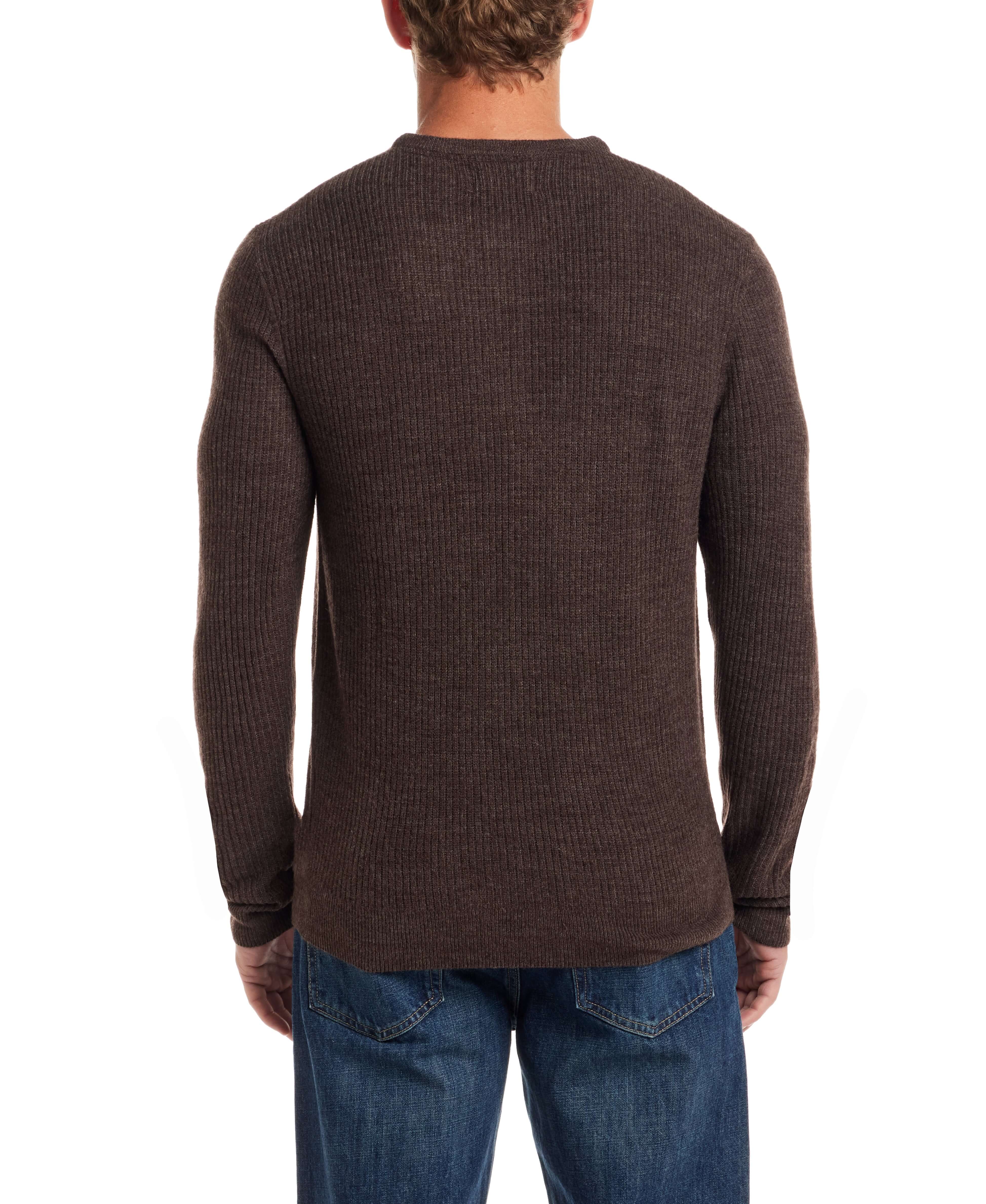 Back view of a man wearing a chocolate torte soft touch vertical stitch sweater with a classic fit and four-button placket.