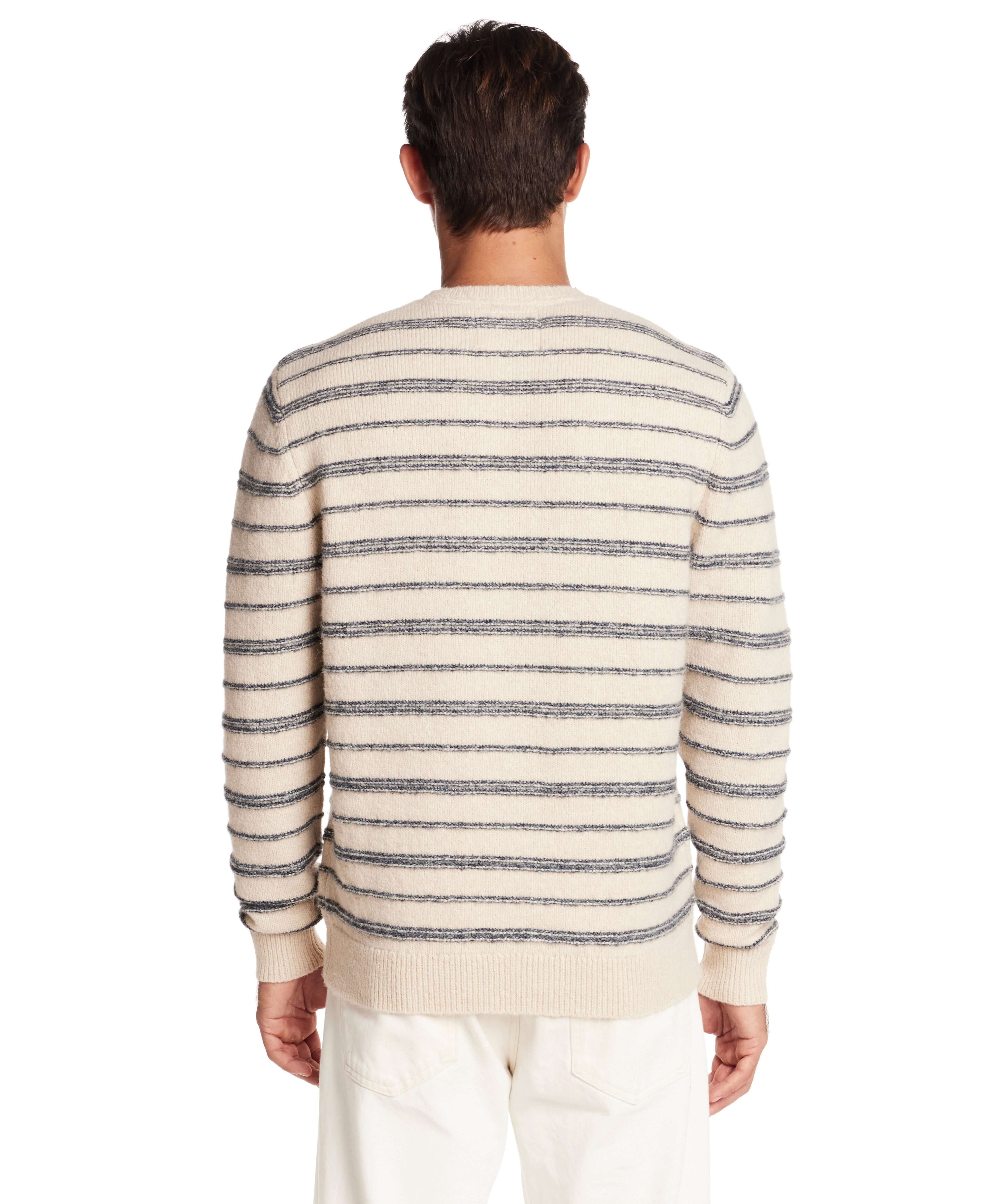 Back view of a fuzzy striped crew sweater in cream and blue, showcasing its classic fit and soft texture.