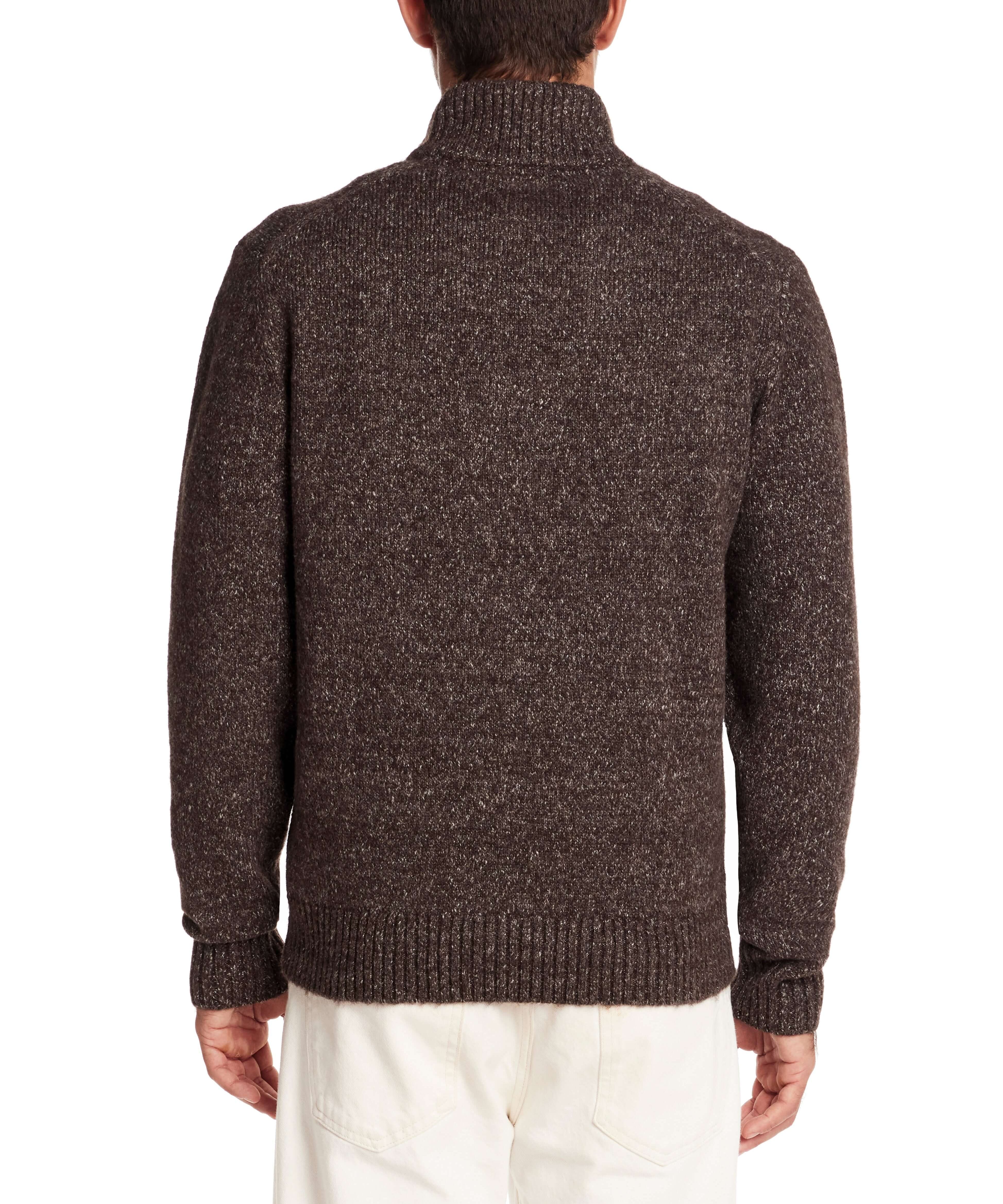 Back view of a fuzzy brown quarter zip sweater featuring a mock neck and ribbed cuffs, perfect for cool weather.