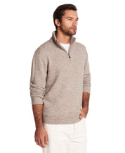 Fuzzy quarter zip sweater in taupe on a man, showcasing a soft feel, mock neck, and ribbed cuffs for modern styling.