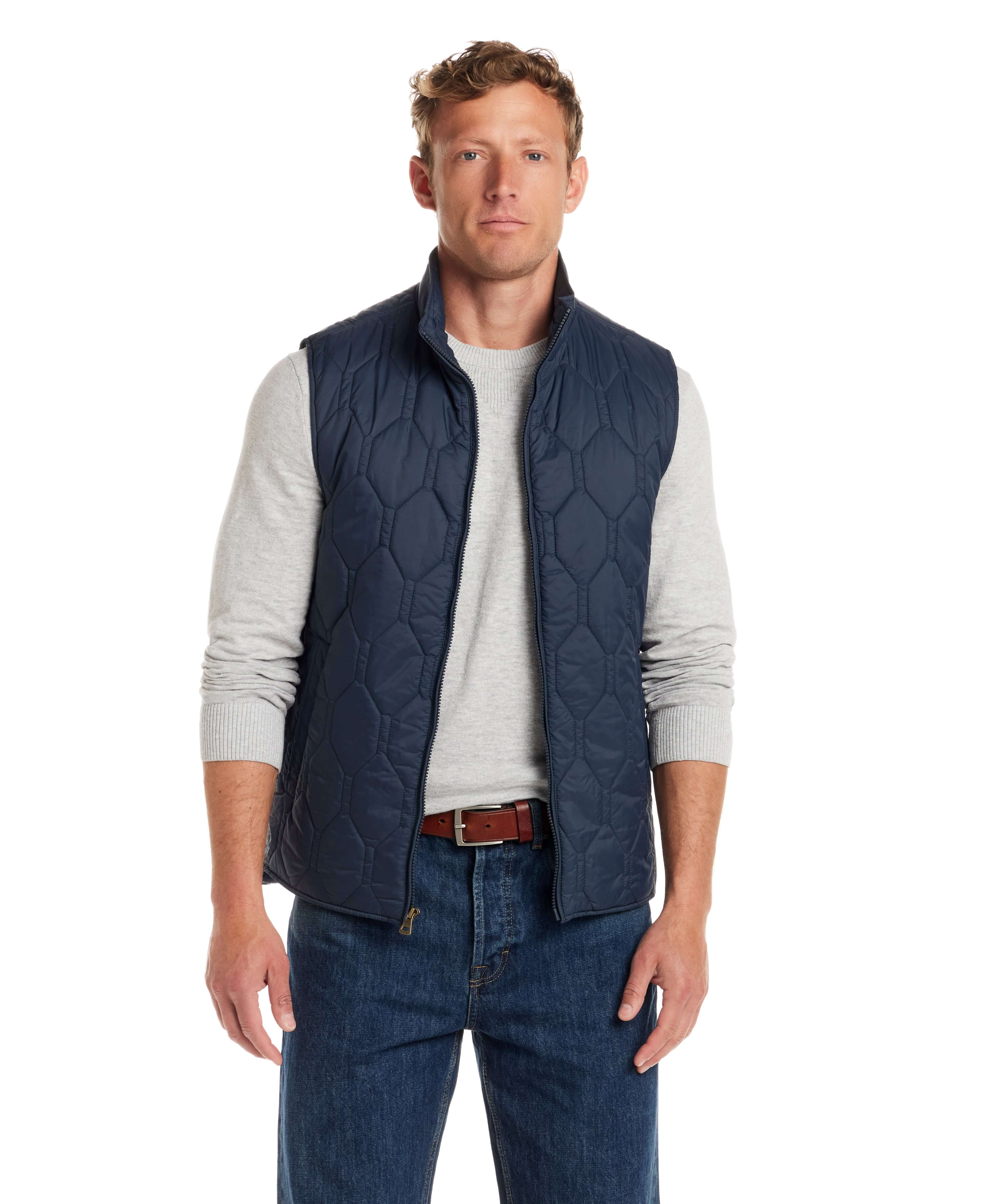 Hexagon quilted lightweight vest in slate blue, featuring a front zip closure and mock-neck for style and utility.