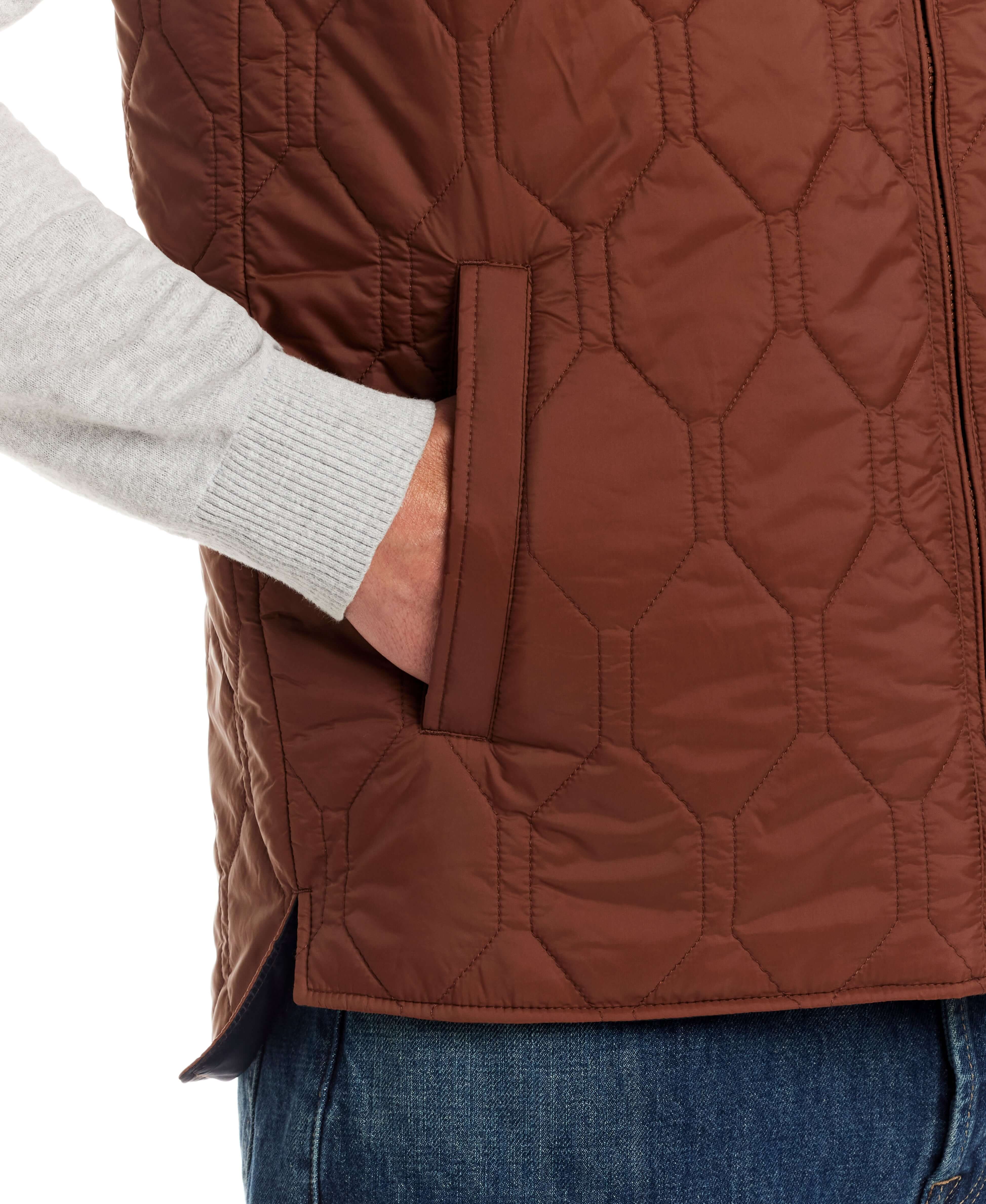 Hexagon quilted lightweight vest in cappuccino with side pockets, showcasing rugged style and functionality.