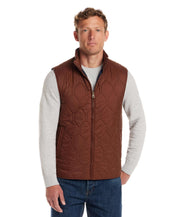 Model wearing a Hexagon Quilted Lightweight Vest in Cappuccino, showcasing classic style and functionality.