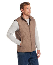 Men's hexagon quilted lightweight vest in mountain trail color, featuring front zipper and classic fit.