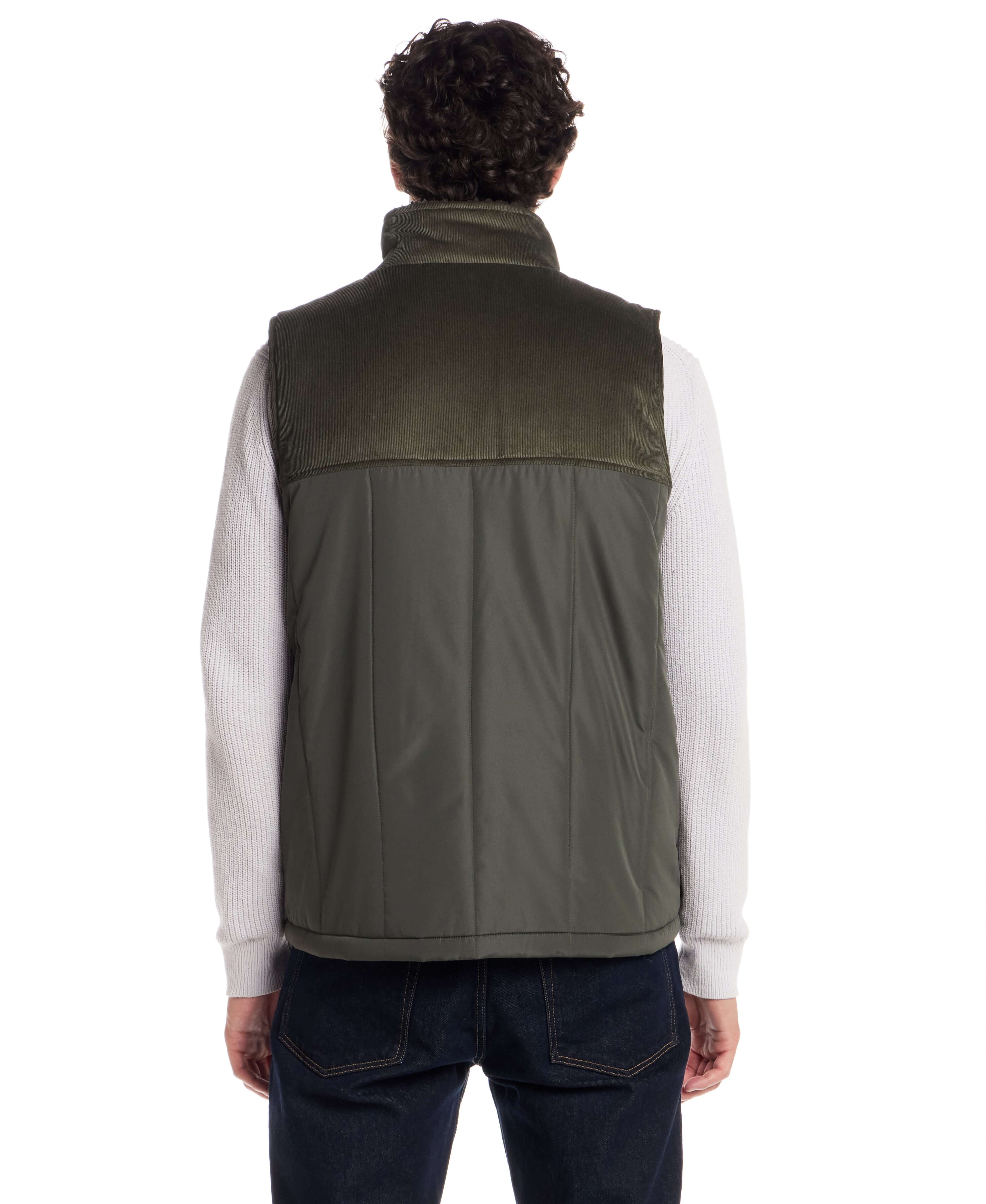Sherpa Lined Mixed Media Puffer Vest in Kambaba Olive, showing back view with corduroy and soft lining.