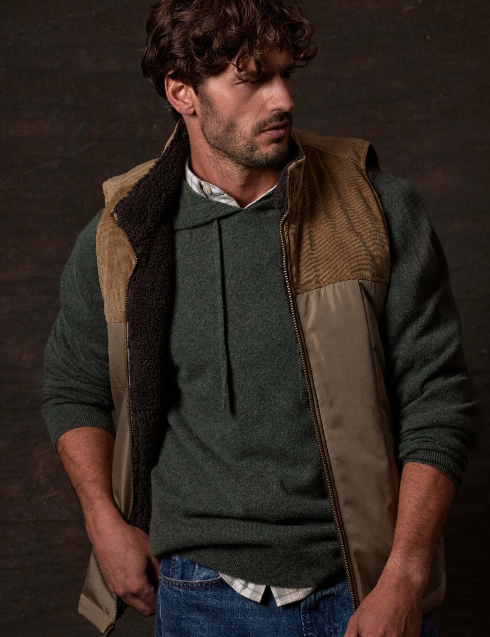 Sherpa Lined Mixed Media Puffer Vest in Kangaroo showcased on model, highlighting its rugged style and cozy design.