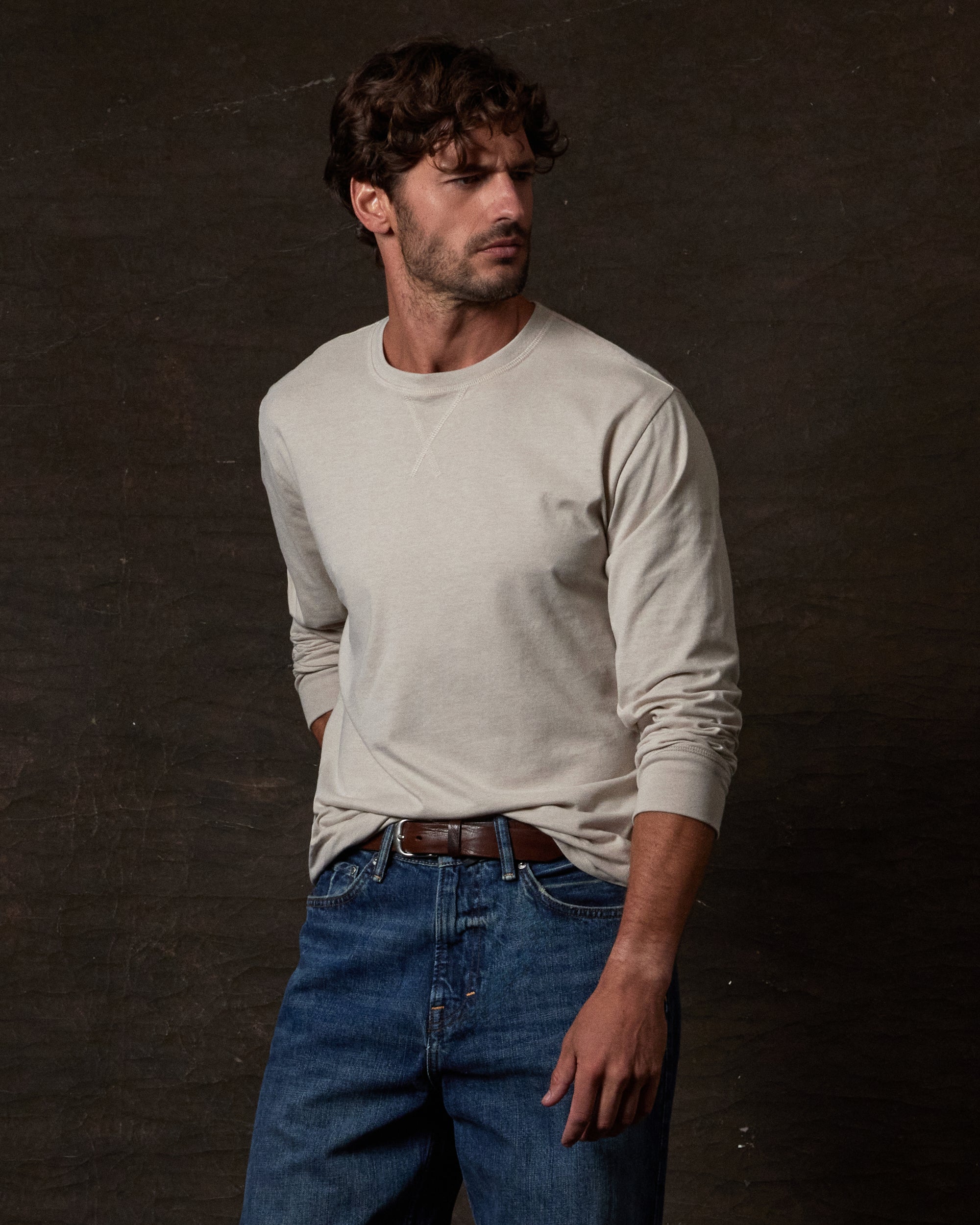 Long Sleeve Brushed Jersey Crew in NATURAL worn by a model with jeans, showcasing a classic layering look.