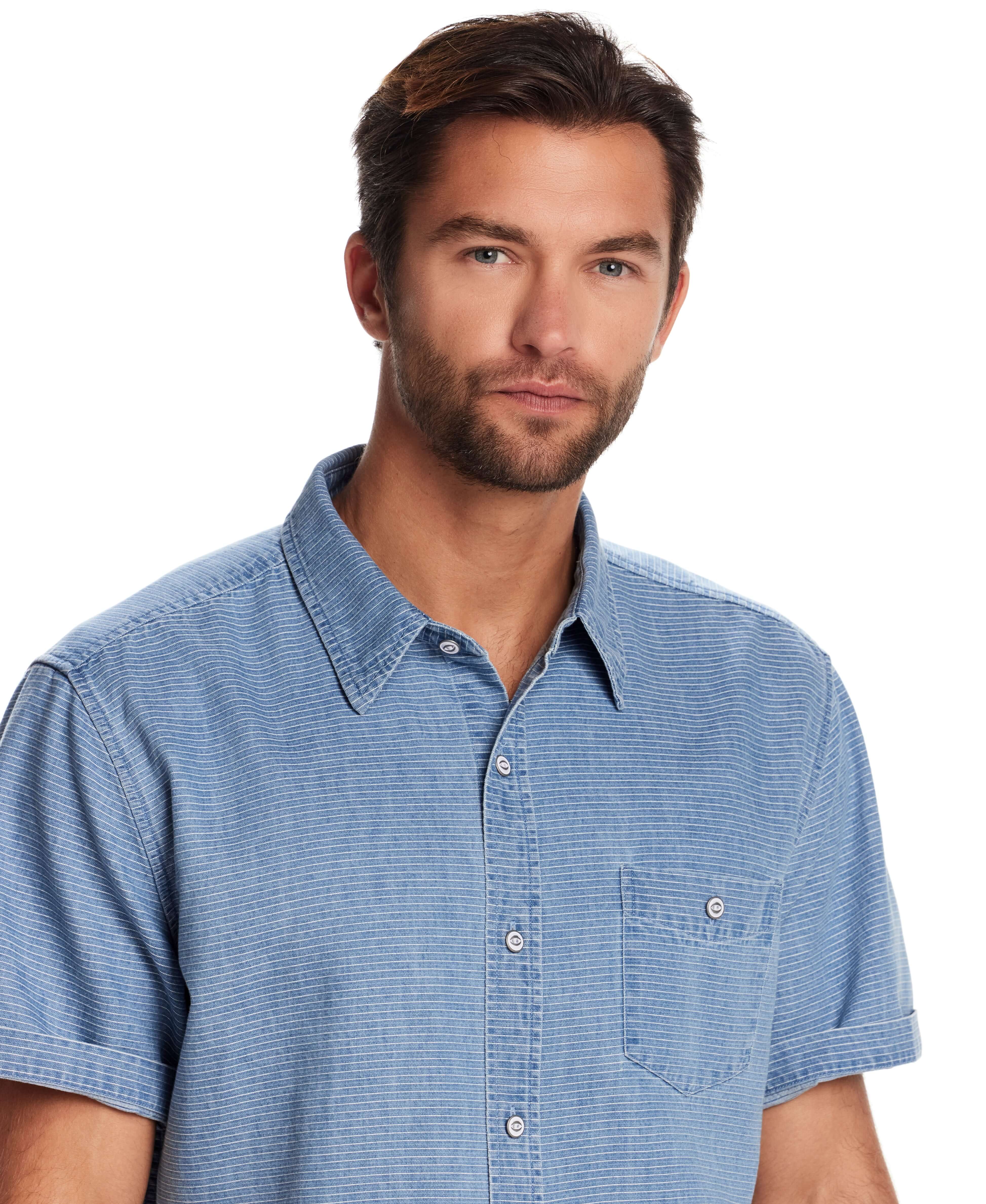 Model showcasing a short sleeve stripe denim shirt in serenity blue, featuring a classic collar and chest pocket.