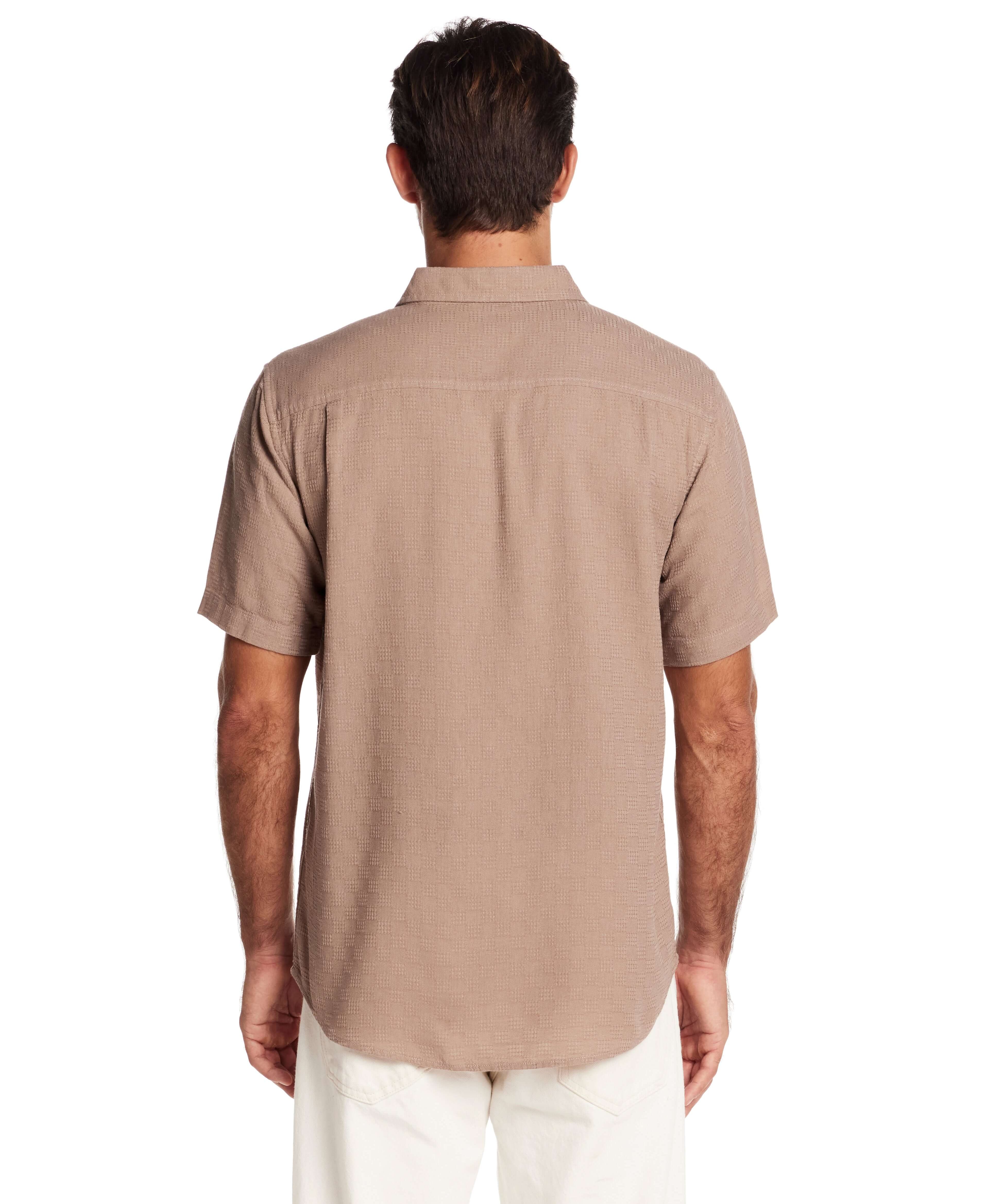 Back view of a short sleeve textured dobby button-down shirt in Mountain Trail color, showcasing a relaxed fit and clean lines.