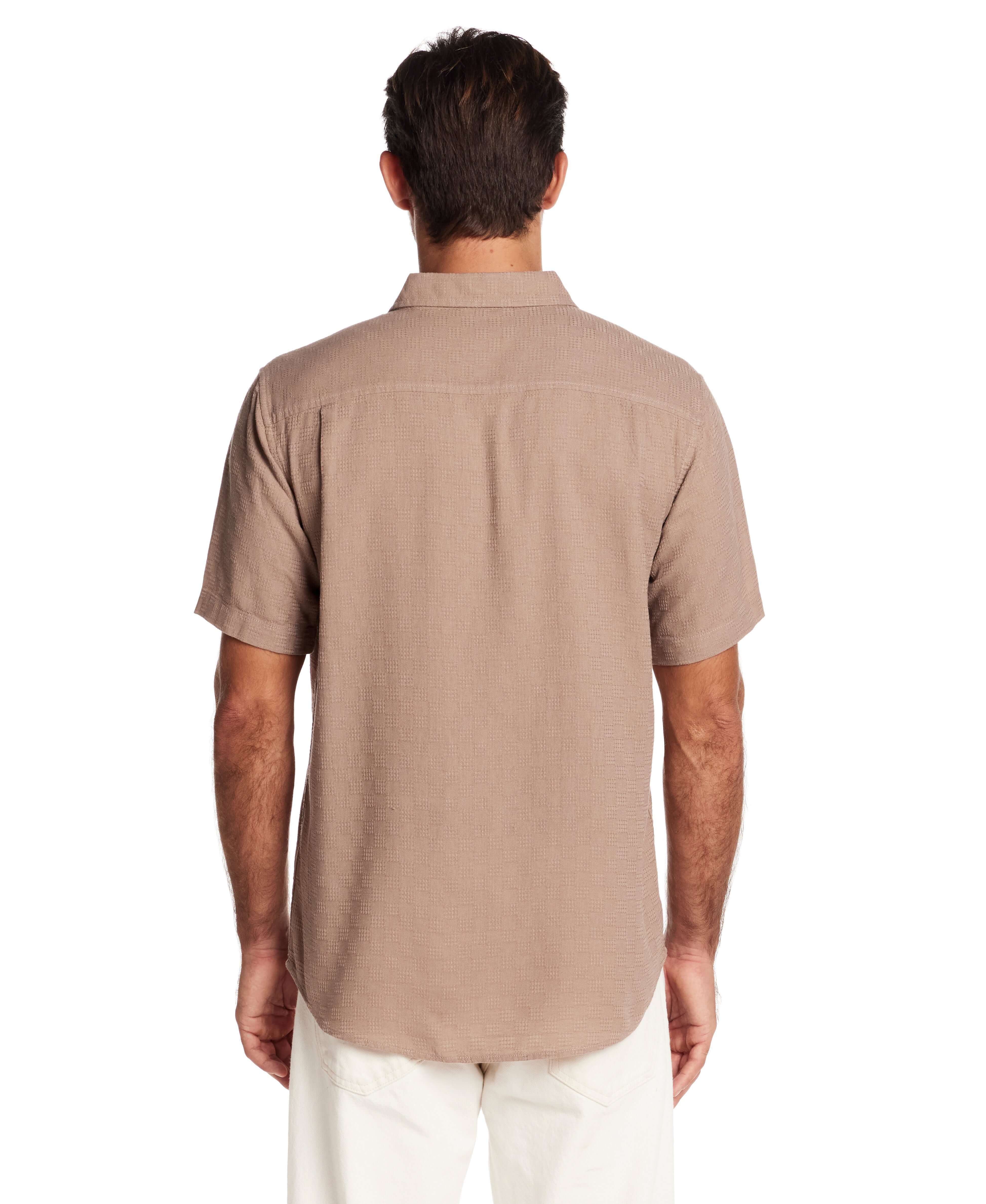 Back view of a short sleeve textured dobby button-down shirt in Mountain Trail color, showcasing a relaxed fit and clean lines.
