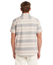 Back view of a short sleeve shirt featuring a striped design in soft colors, showcasing its relaxed fit and lightweight fabric.