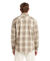 Back view of a man wearing a long sleeve burnout flannel shirt in angora, featuring a plaid pattern.