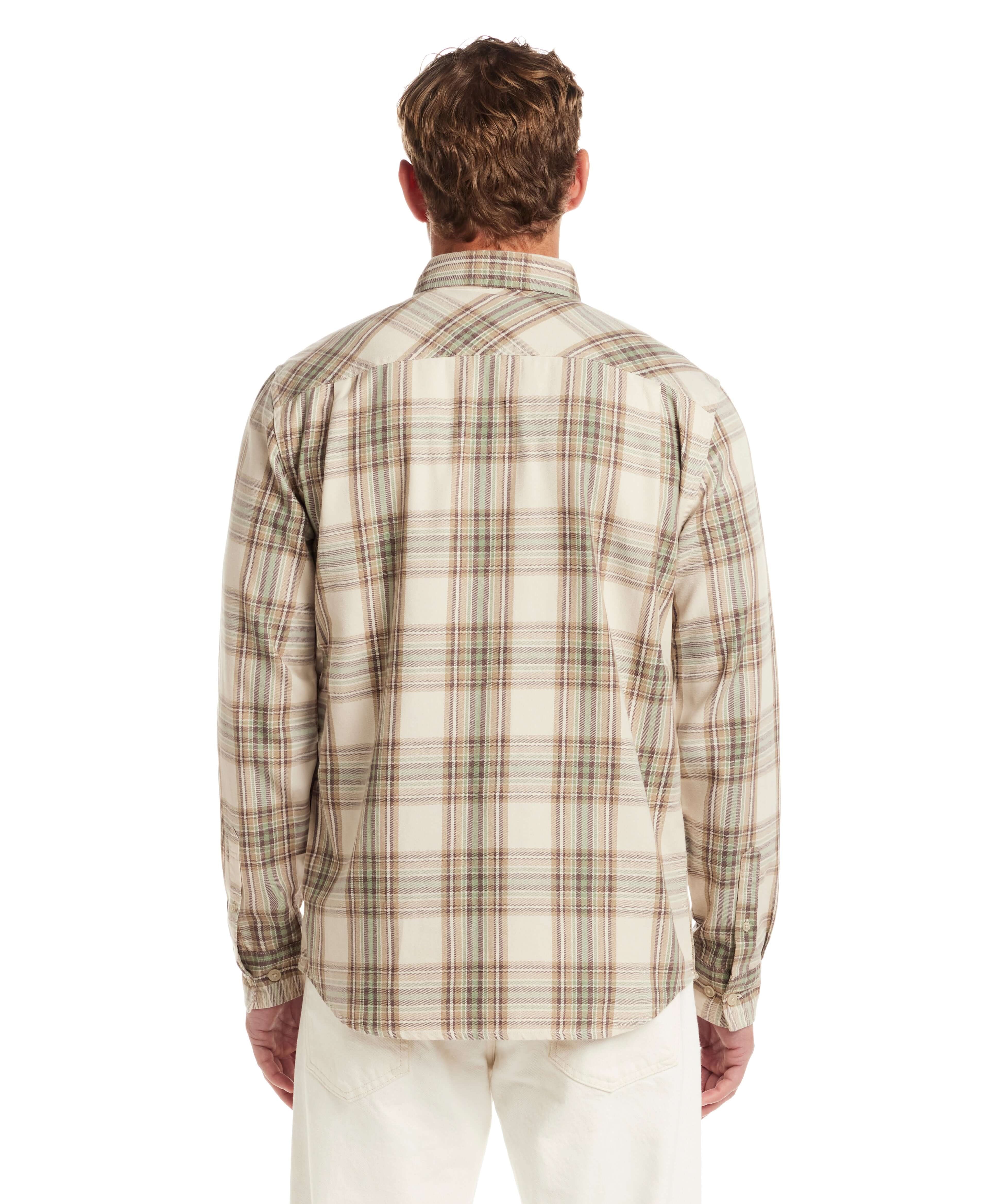 Back view of a man wearing a long sleeve burnout flannel shirt in angora, featuring a plaid pattern.