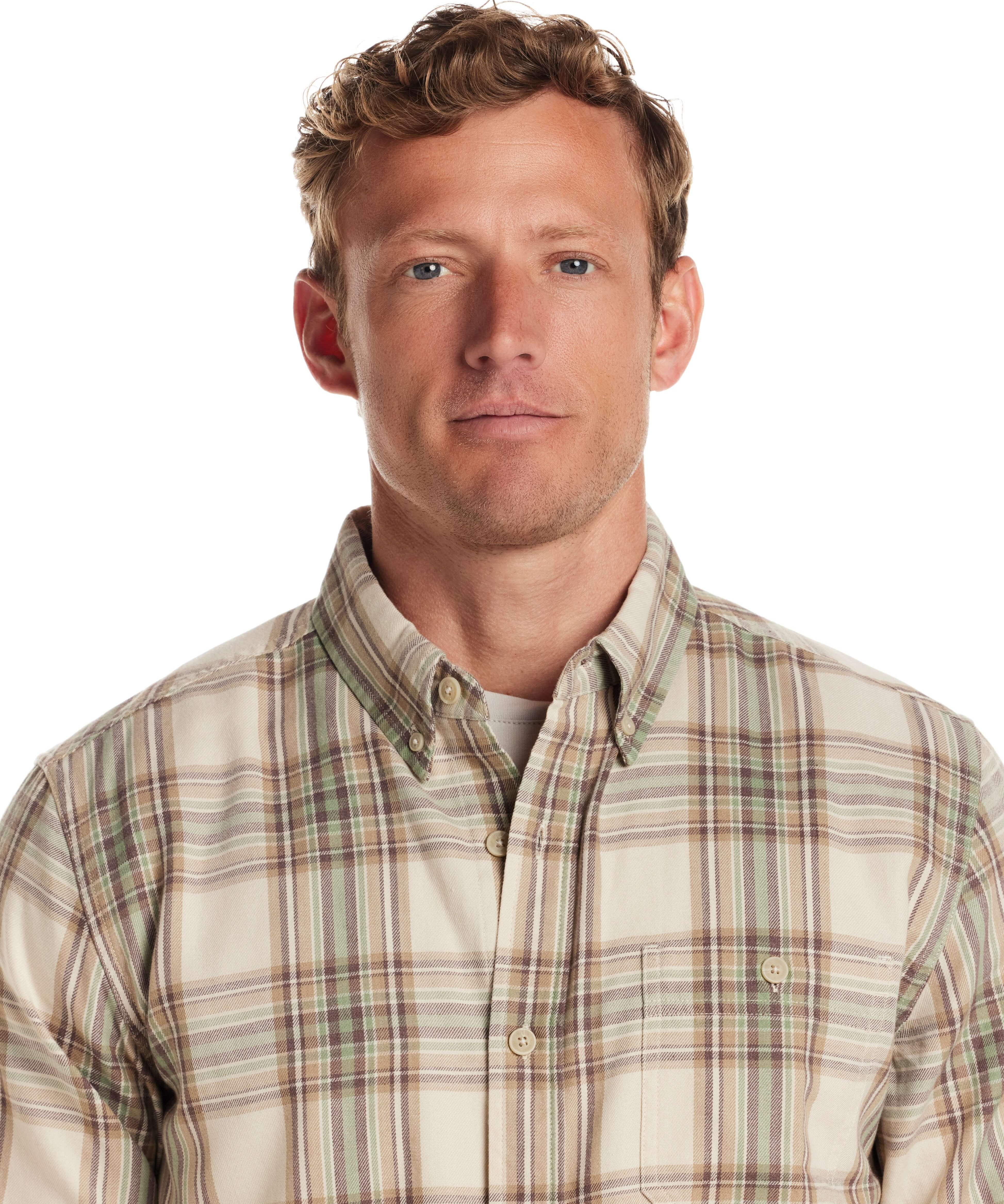 Model wearing a classic fit long sleeve burnout flannel shirt in soft lightweight material with plaid design.