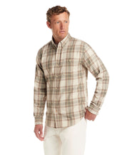 Model wearing a Long Sleeve Burnout Flannel in Angora with weathered plaid pattern, ideal for layering.