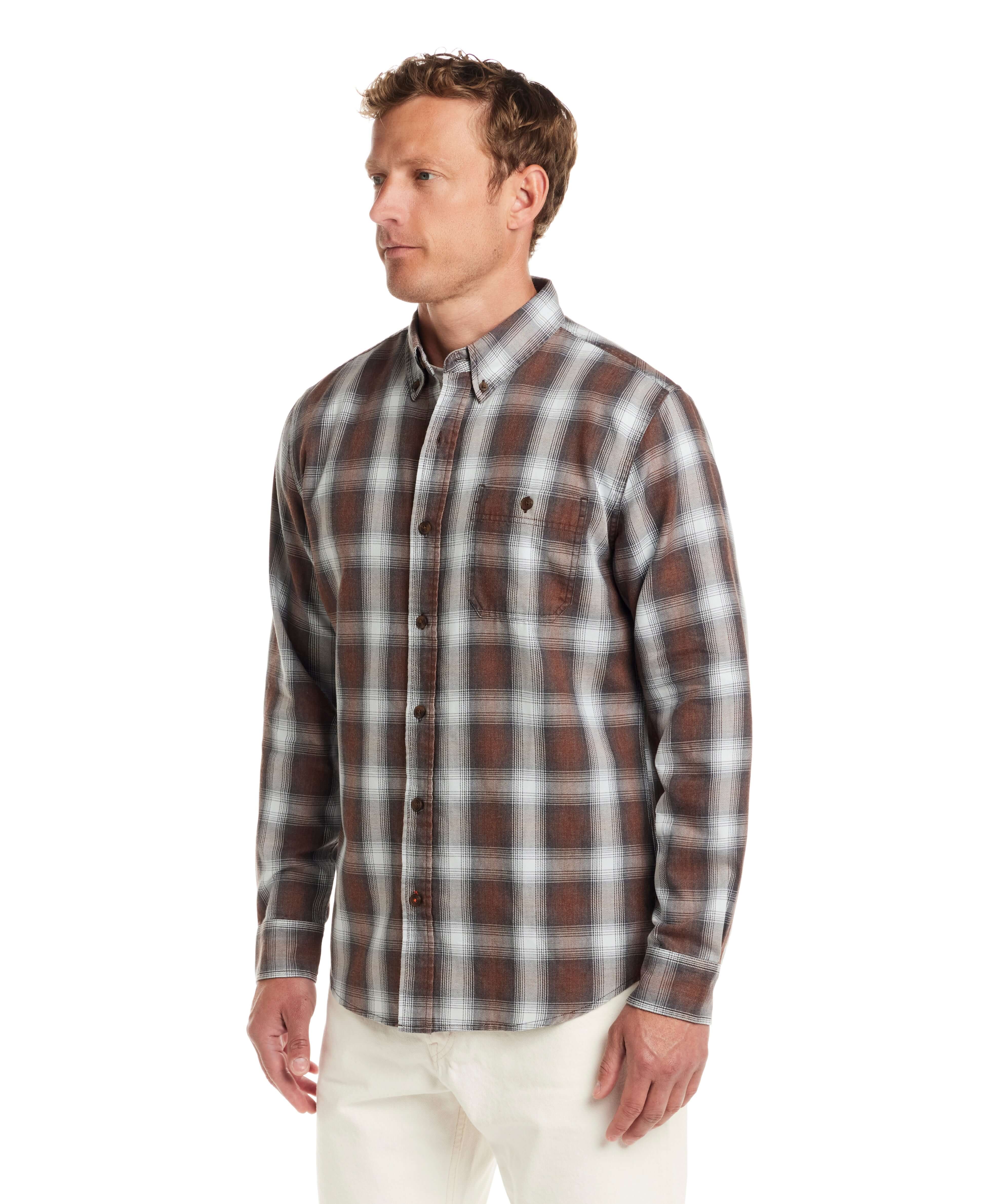 Model wearing Long Sleeve Burnout Flannel in Chicory, featuring plaid design, button-down collar, and chest pocket.