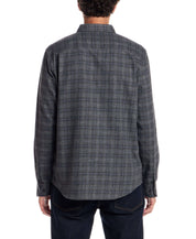 Back view of a man wearing a Long Sleeve Brushed Flannel shirt in Winter Moss, showcasing its soft, rustic plaid design.