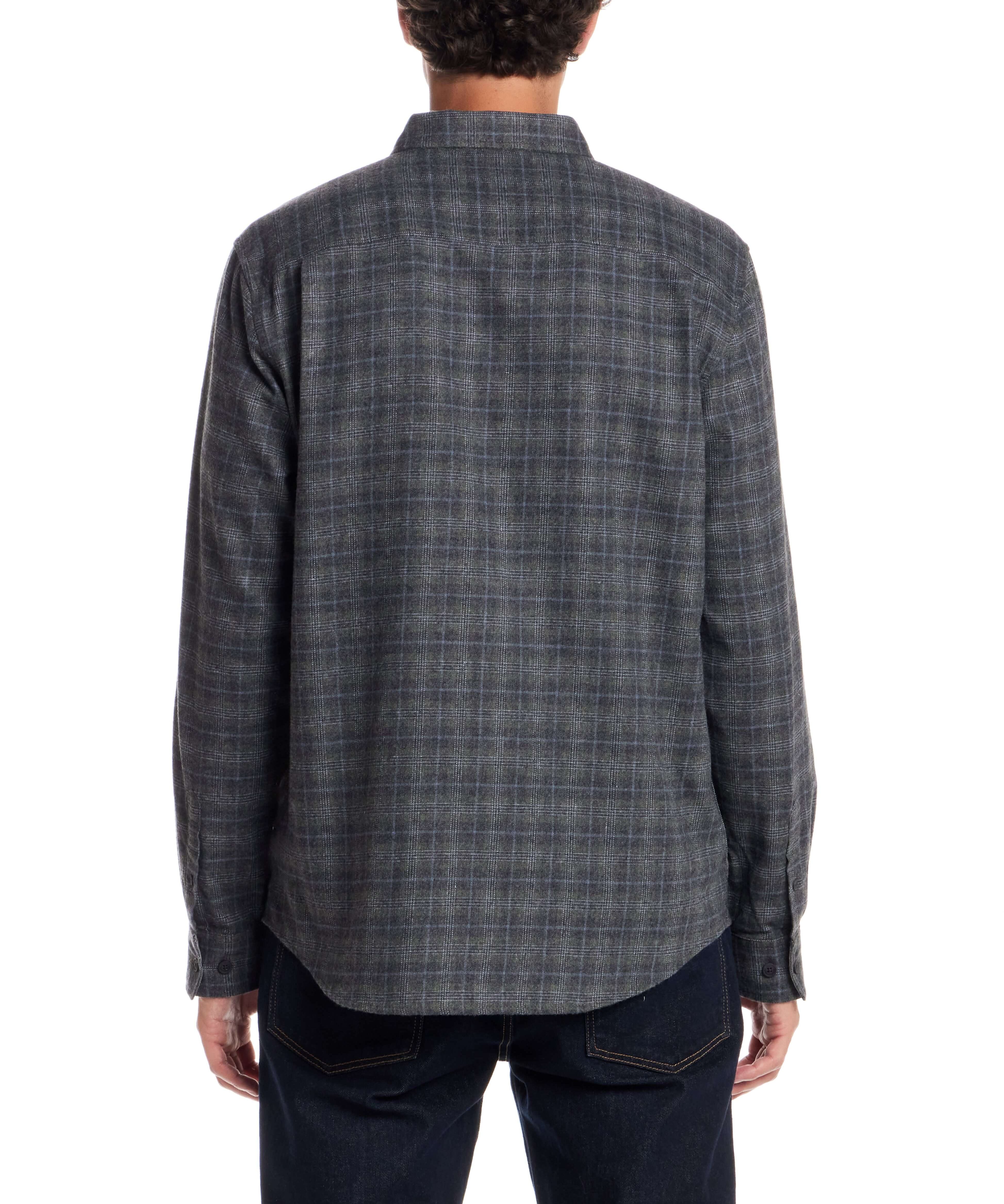 Back view of a man wearing a Long Sleeve Brushed Flannel shirt in Winter Moss, showcasing its soft, rustic plaid design.