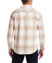 Back view of a man's long sleeve brushed flannel shirt in Whitecap Grey with a plaid pattern, ideal for layering.