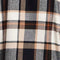 Close-up of a caramel cafe plaid flannel shirt featuring a classic button-down collar and soft cotton blend fabric.