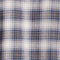 Close-up of Windward Blue brushed flannel fabric features a classic plaid pattern in shades of blue and white.