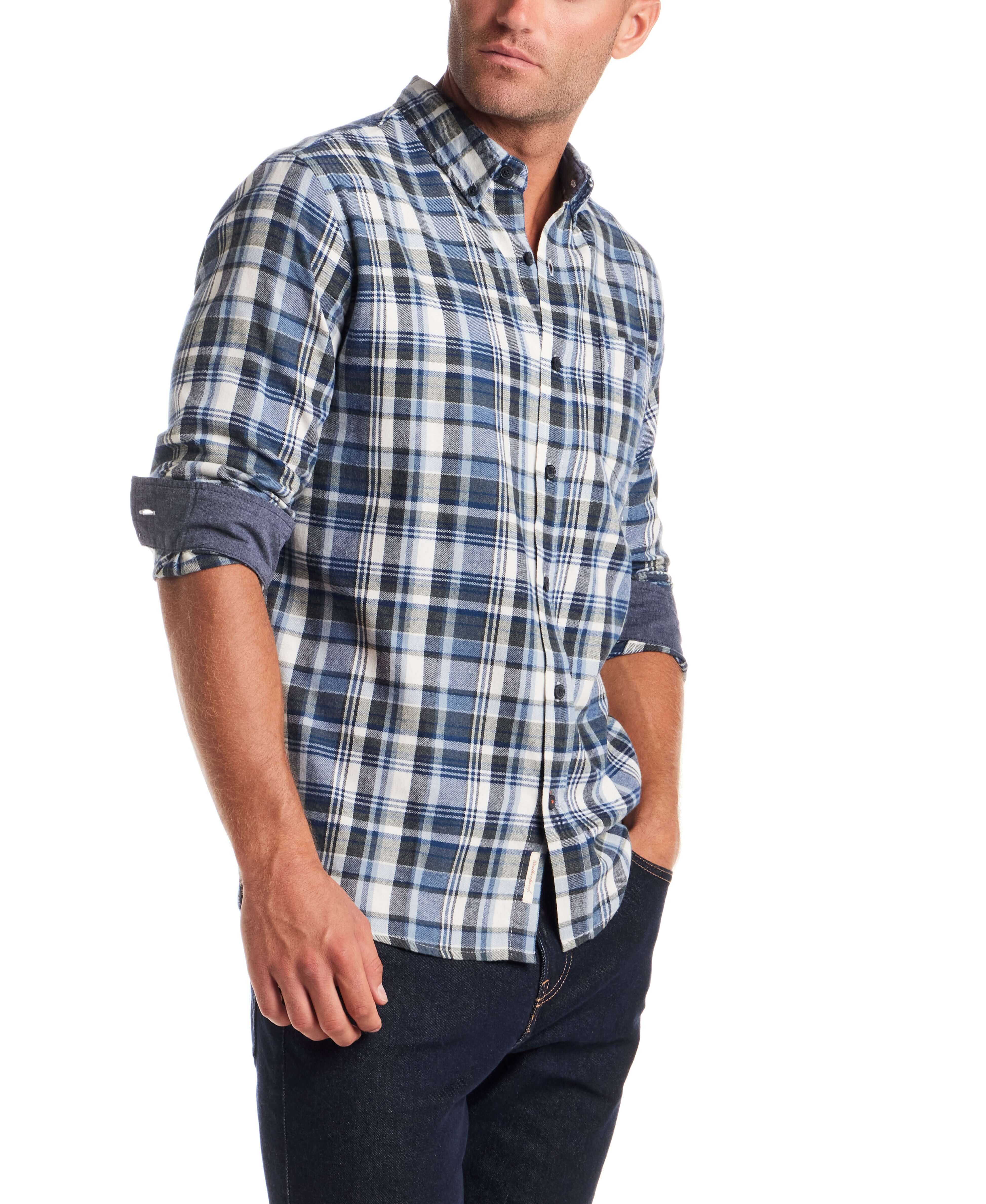 Stylish man wearing a Long Sleeve Brushed Flannel in Blue Fusion, featuring a button-down collar and classic cut.