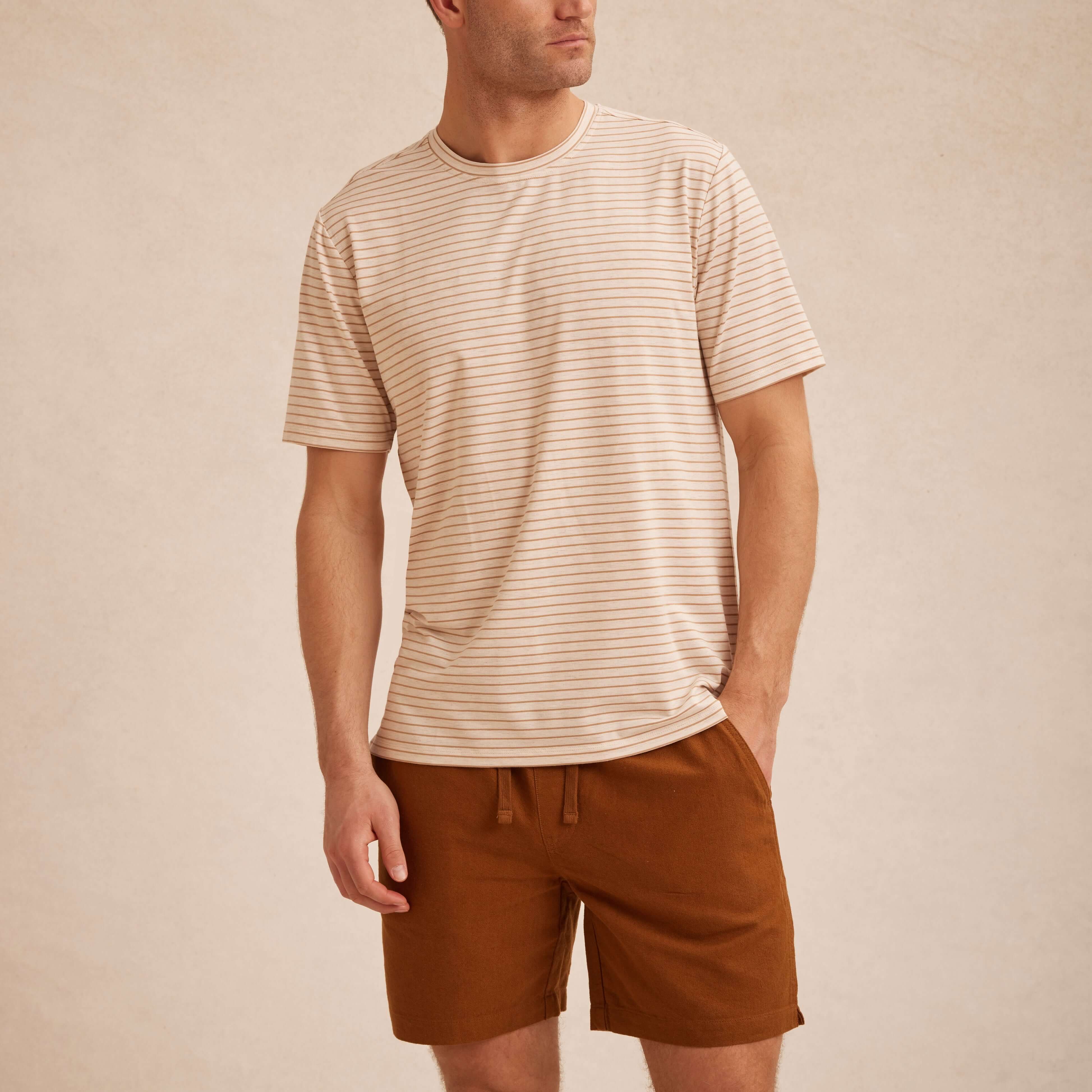 Striped Stretch Crewneck T-Shirt in Tan worn by a man with short sleeves and clean stripe pattern.