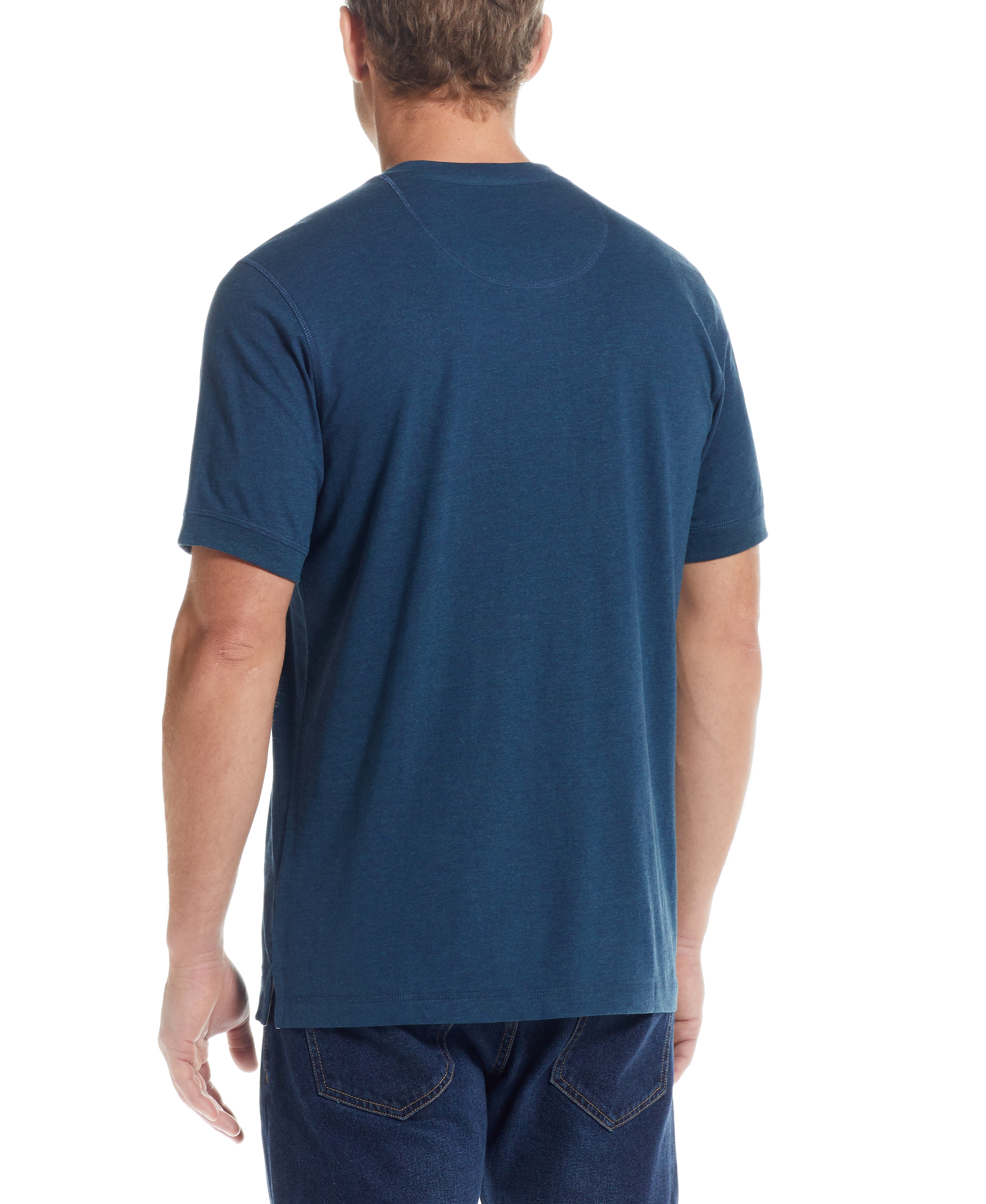 Back view of a man wearing a Short Sleeve Henley in Deep Cobalt, showcasing the relaxed fit and rib-knit detail.