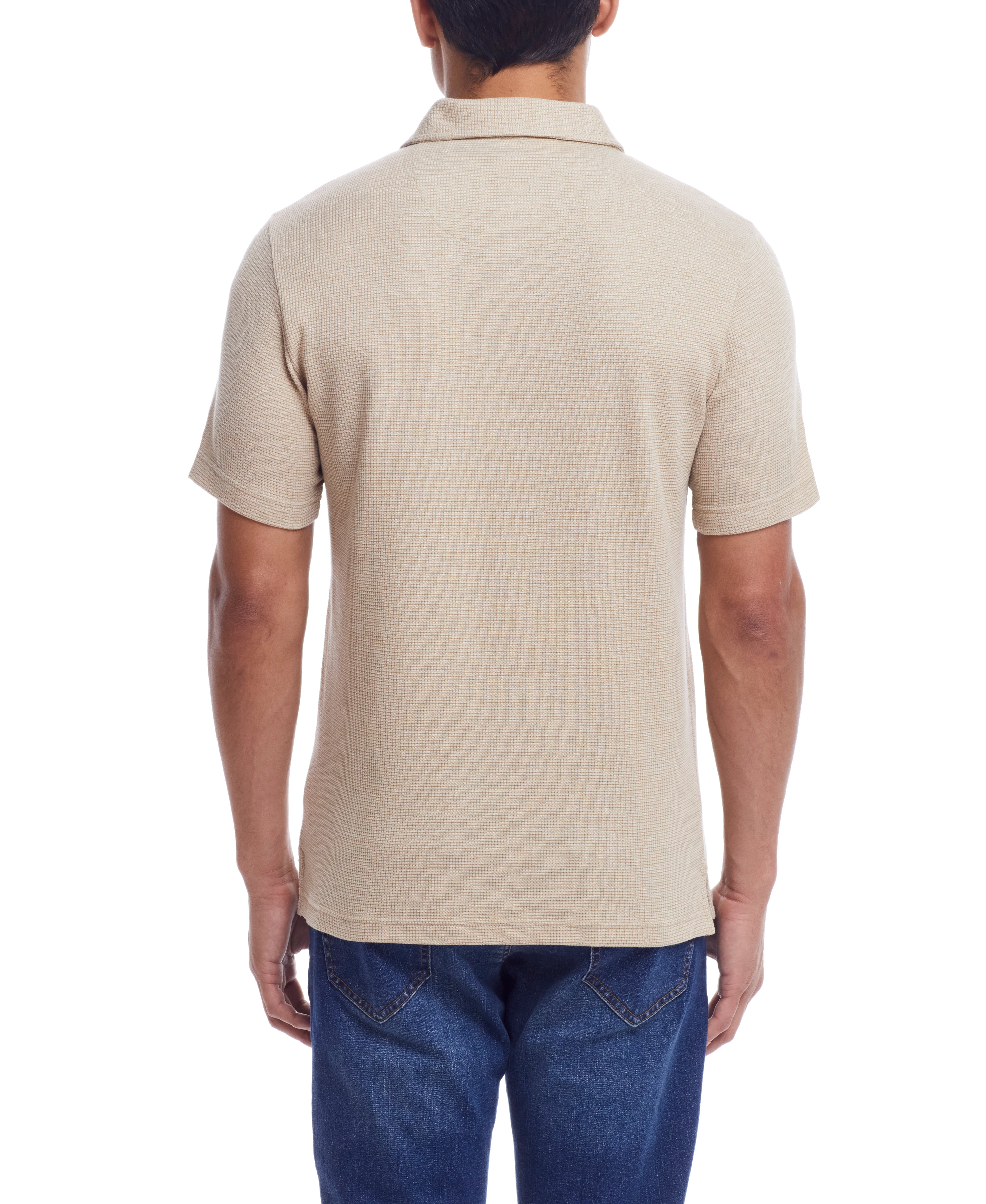 Back view of a man wearing a Waffle Polo In Antique White showcasing its classic fit and short sleeves.
