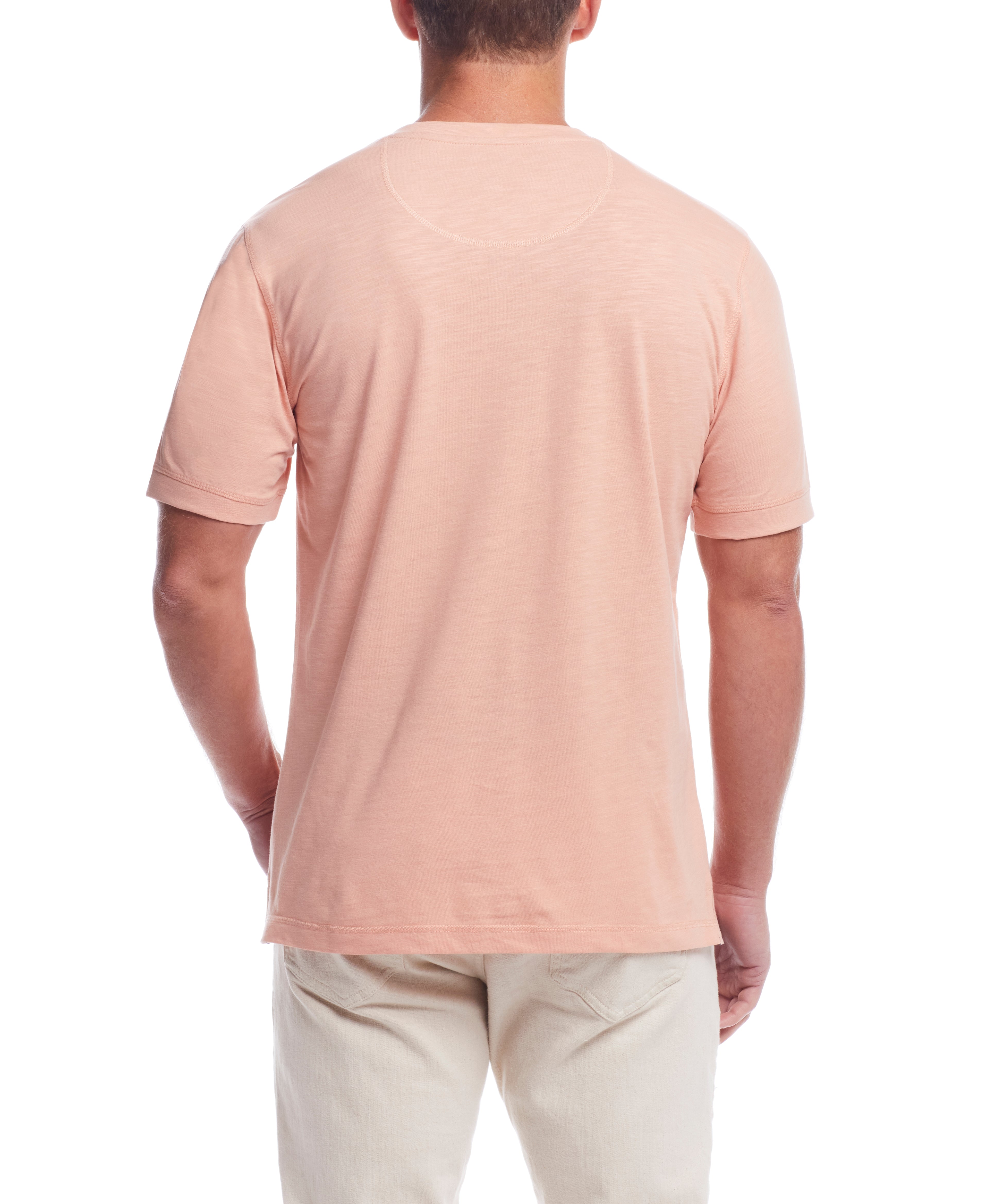 Back view of a model wearing a Short Sleeve Melange Henley In Dusty Pink, showcasing the classic design.