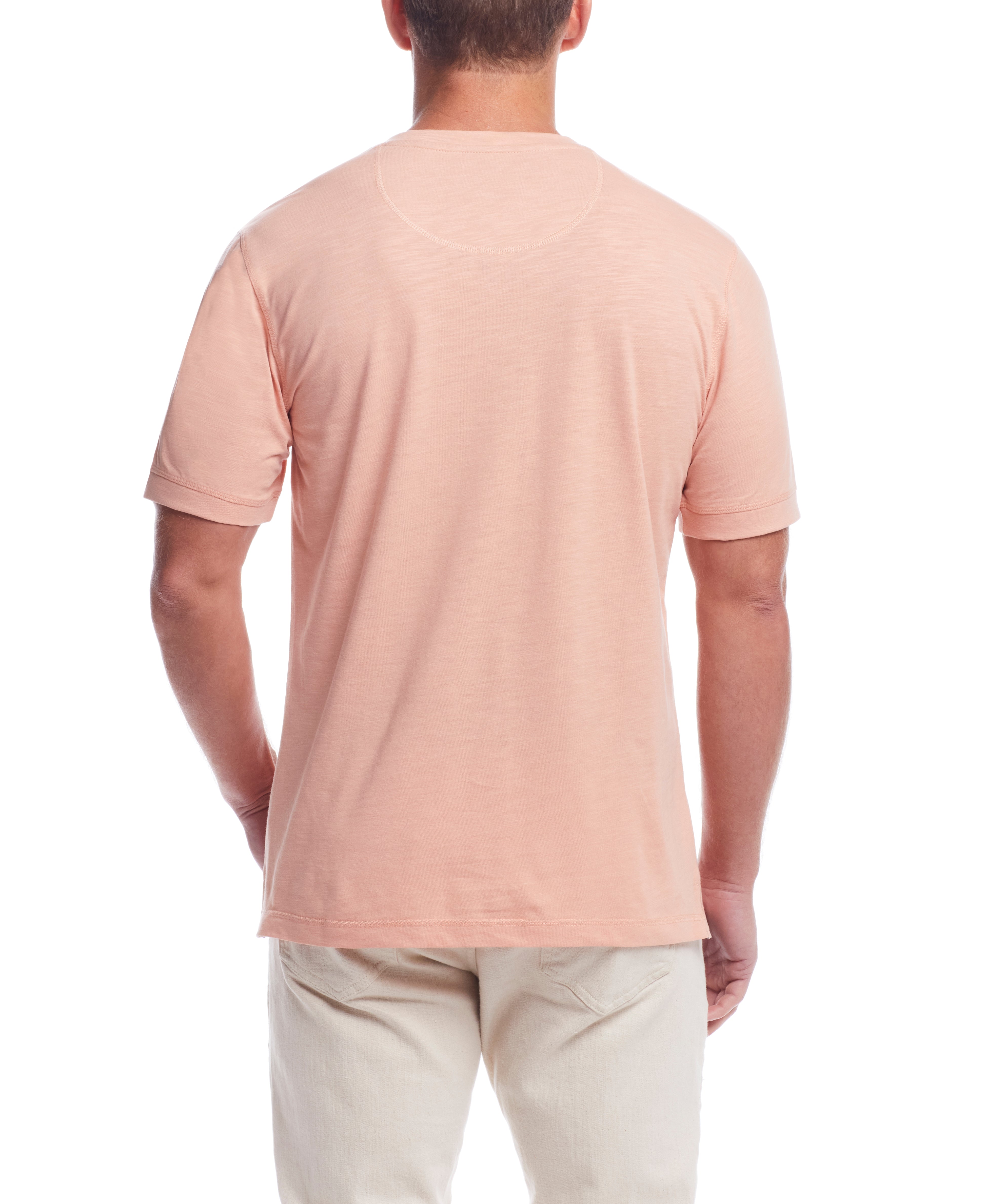 Back view of a model wearing a Short Sleeve Melange Henley In Dusty Pink, showcasing the classic design.