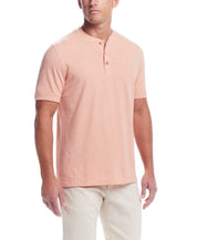Short Sleeve Melange Henley In Dusty Pink modeled by a man, showcasing its classic style and comfort.