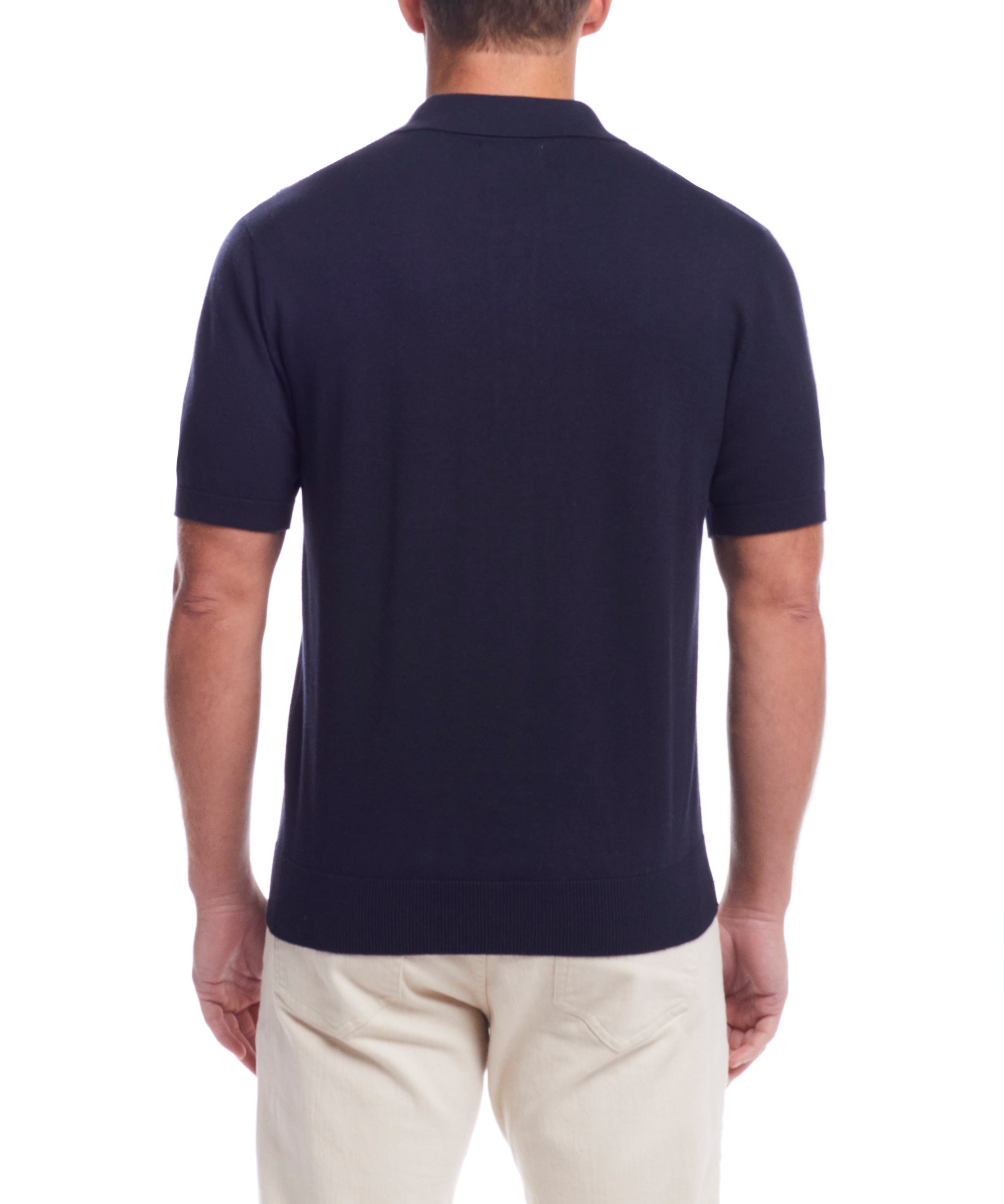 Short Sleeve Polo Sweater In Navy shown from the back, featuring a standard fit and comfortable design.