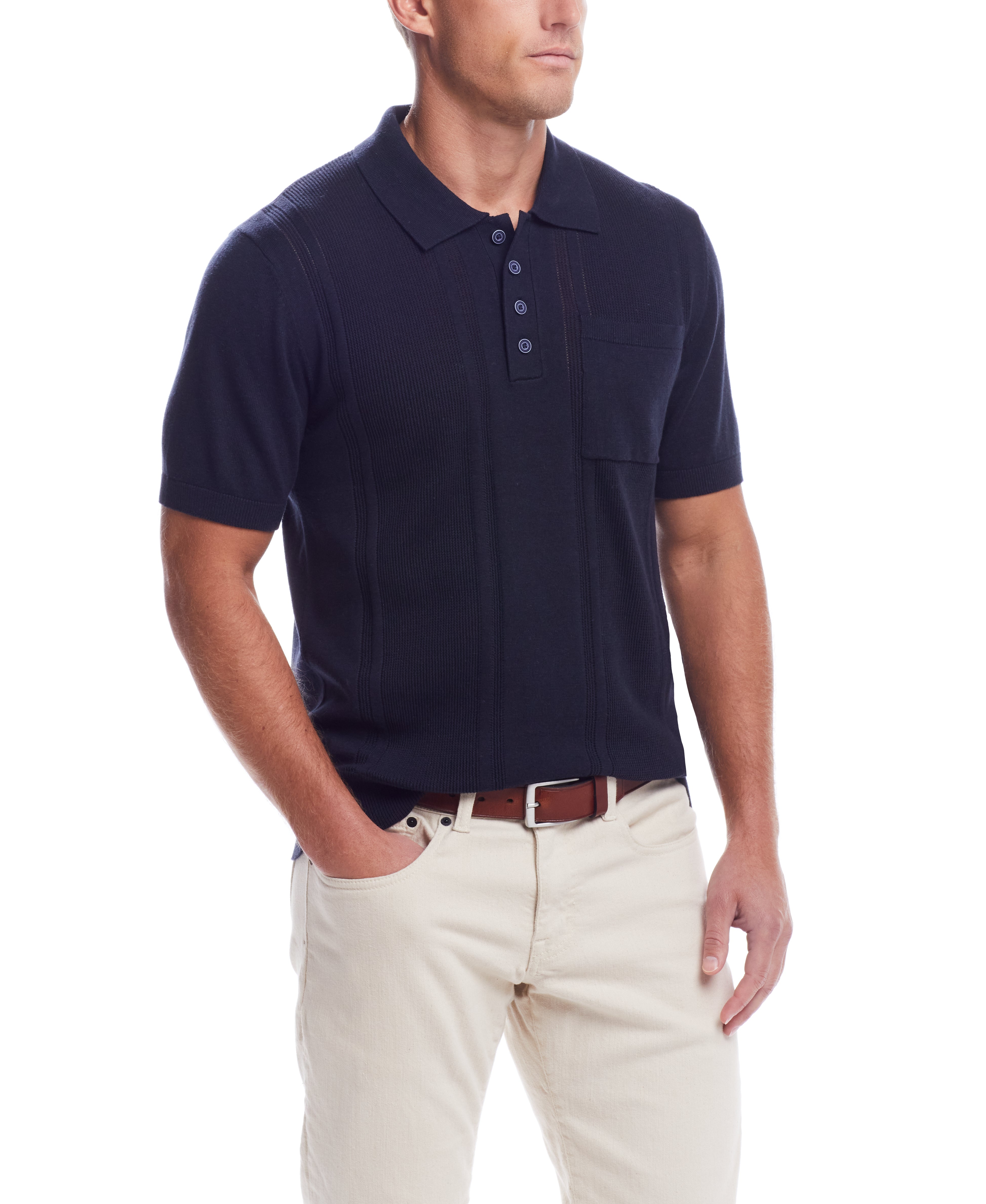 Short Sleeve Polo Sweater In Navy worn by a man, featuring a pocket and a comfortable fit.