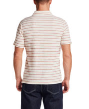 Back view of a man wearing a Retro Terry Striped Polo in Crimson, showcasing its relaxed fit and classic striped design.