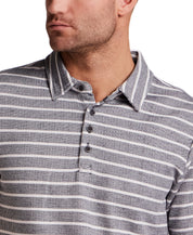 Close-up of a man wearing the Retro Terry Striped Polo in Maritime Blue, showcasing its classic stripe details.