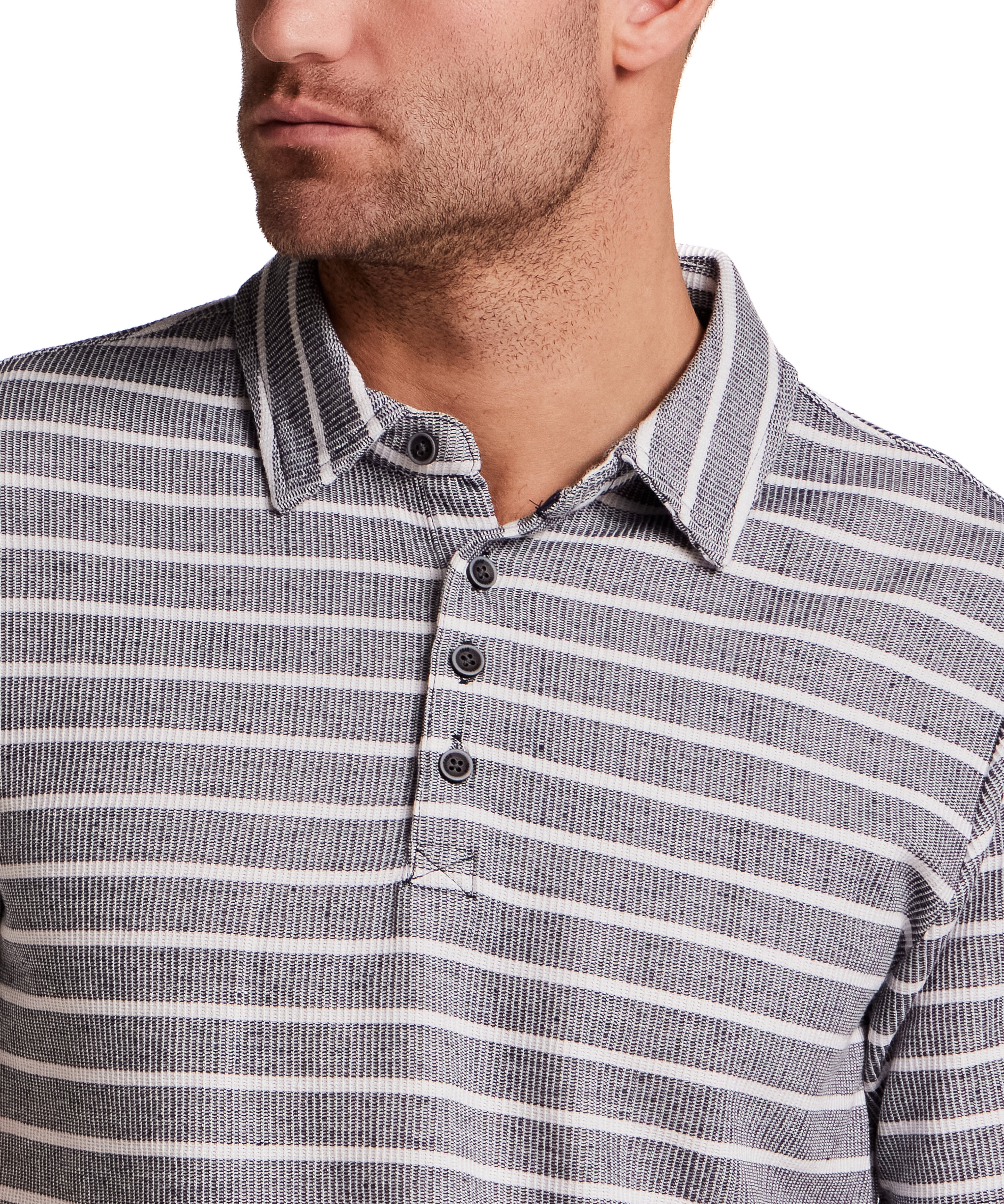 Close-up of a man wearing the Retro Terry Striped Polo in Maritime Blue, showcasing its classic stripe details.