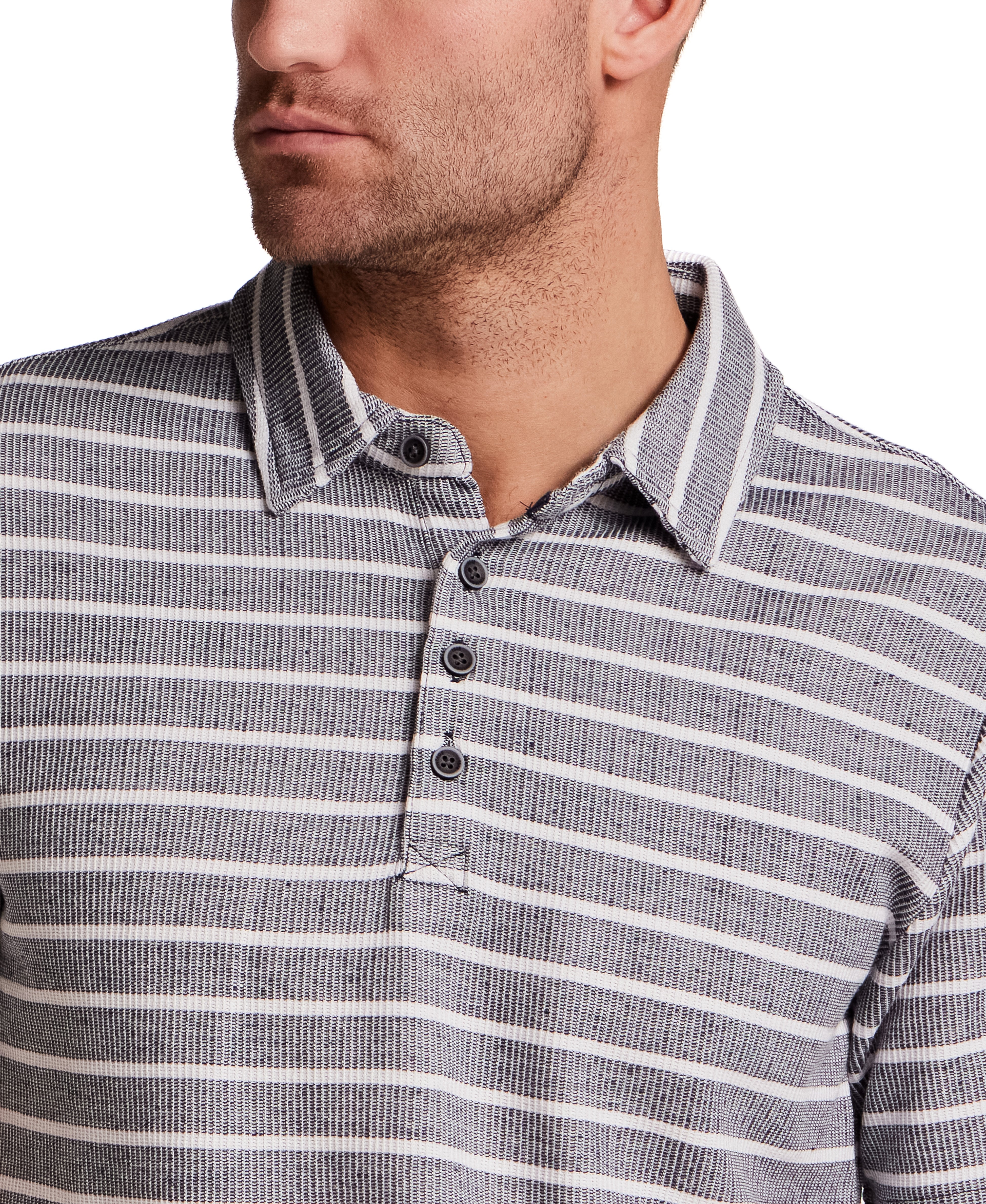 Close-up of a man wearing the Retro Terry Striped Polo in Maritime Blue, showcasing its classic stripe details.
