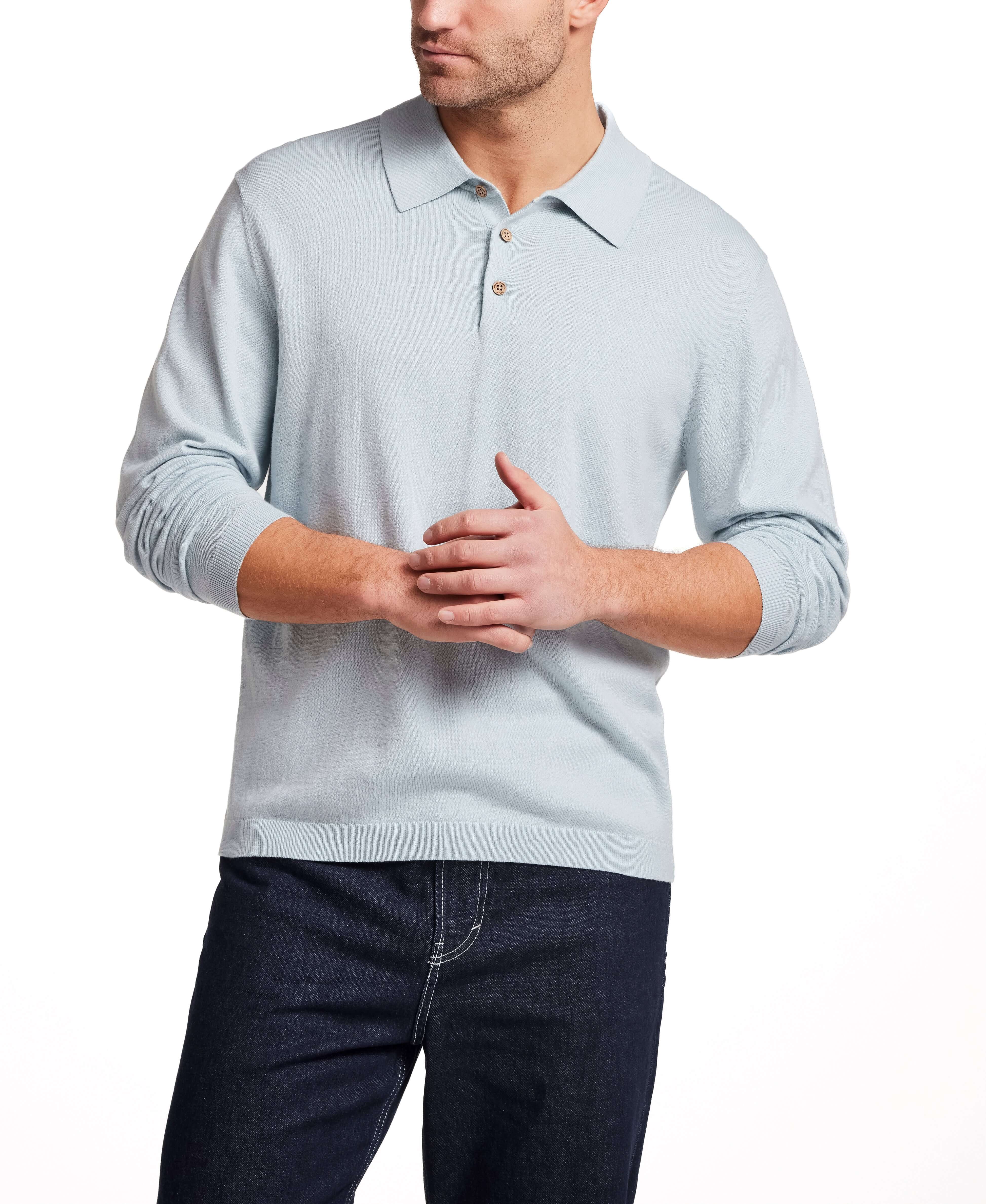 Cotton Cashmere Long Sleeve Polo in Aqua worn by a man, showcasing its soft knit and classic fit.