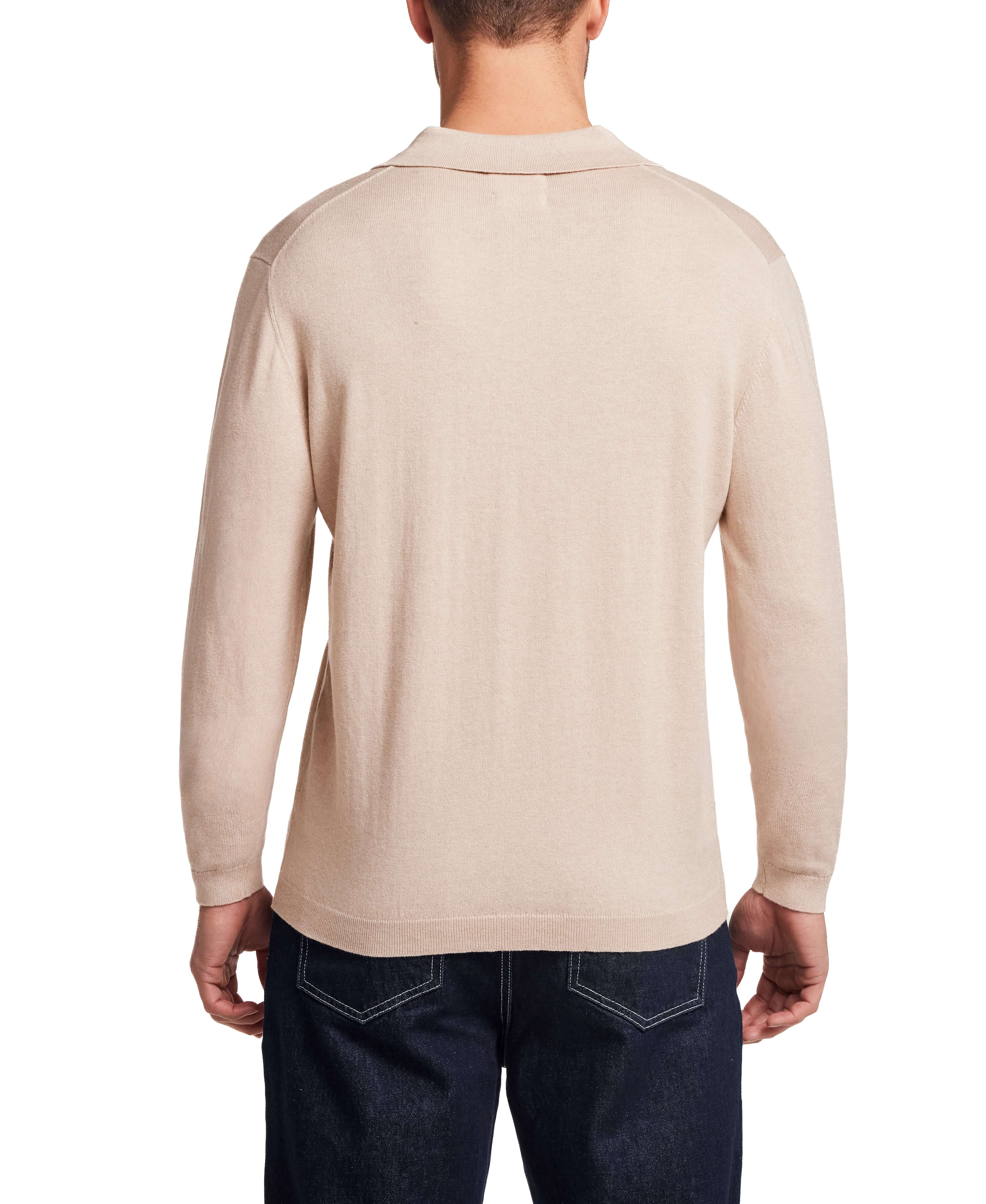 Cotton Cashmere Long Sleeve Polo in Oat displayed from the back, showcasing its classic fit and lightweight knit.