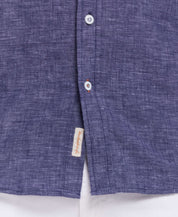 Short Sleeve Solid Linen Cotton in Naval Academy shirt detail featuring buttons and textured fabric.