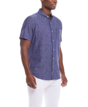 Short Sleeve Solid Linen Cotton in Naval Academy worn by a model, showcasing its comfortable fit and stylish design.