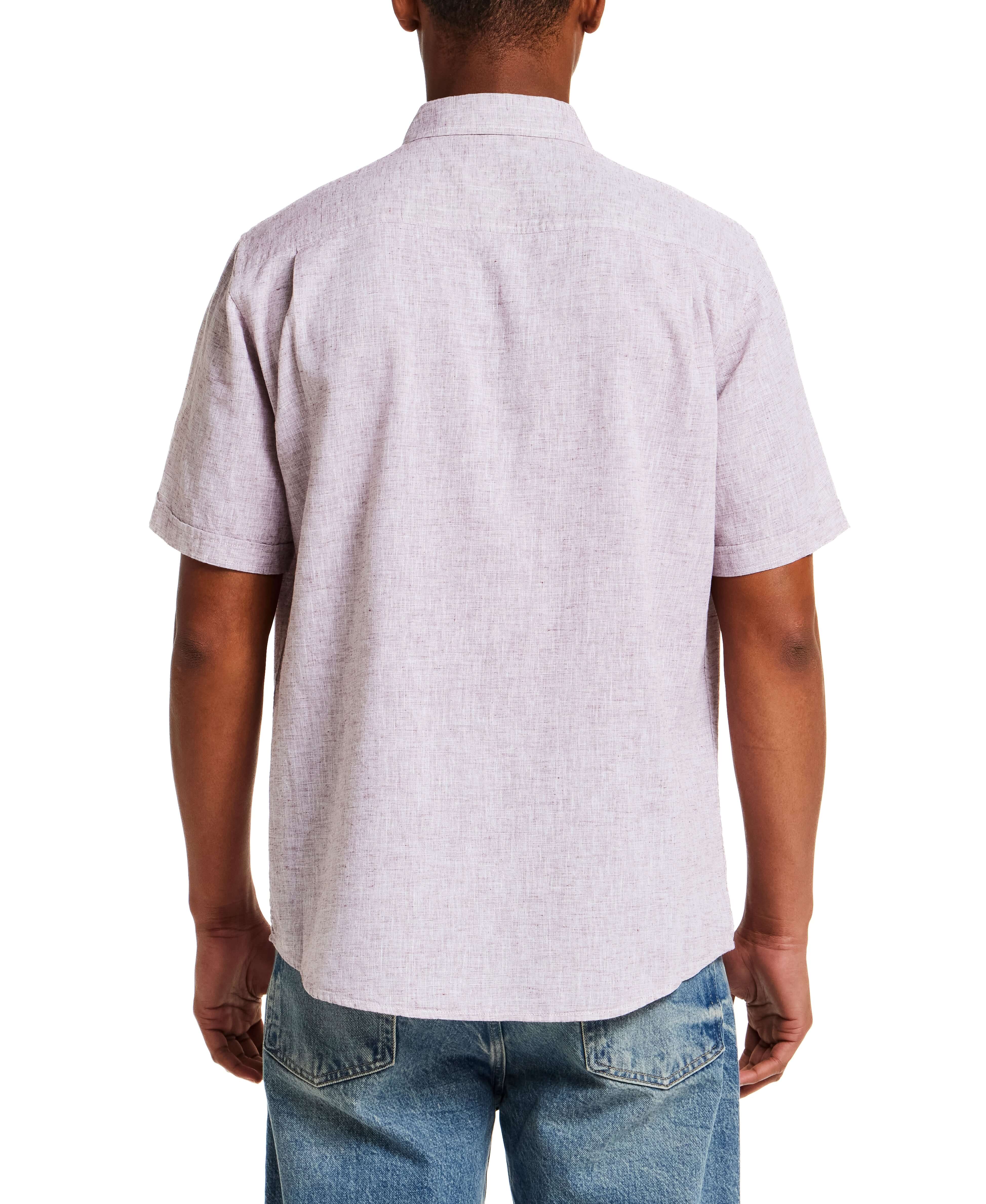 Short Sleeve Solid Linen Cotton in Rose Brown, back view of a man wearing a comfortable linen shirt for effortless style.