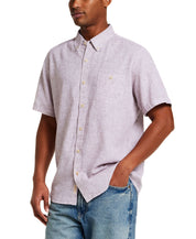 Short Sleeve Solid Linen Cotton in Rose Brown model wearing a casual shirt paired with denim jeans.