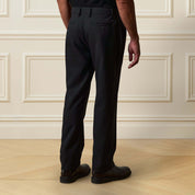 Check Pants in Black/Charcoal showcased from the back, featuring a classic fit and subtle checkered pattern.