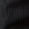 Check Pants in Black/Charcoal fabric close-up showcasing subtle checkered pattern texture.