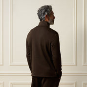 Ribbed Quarter Zip in Brown showcasing the back view, featuring a quarter-zip neckline and soft ribbed texture.