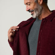 Brushed Corded Shirt Jacket in Fig featuring a relaxed fit and soft brushed texture, shown on a smiling man.