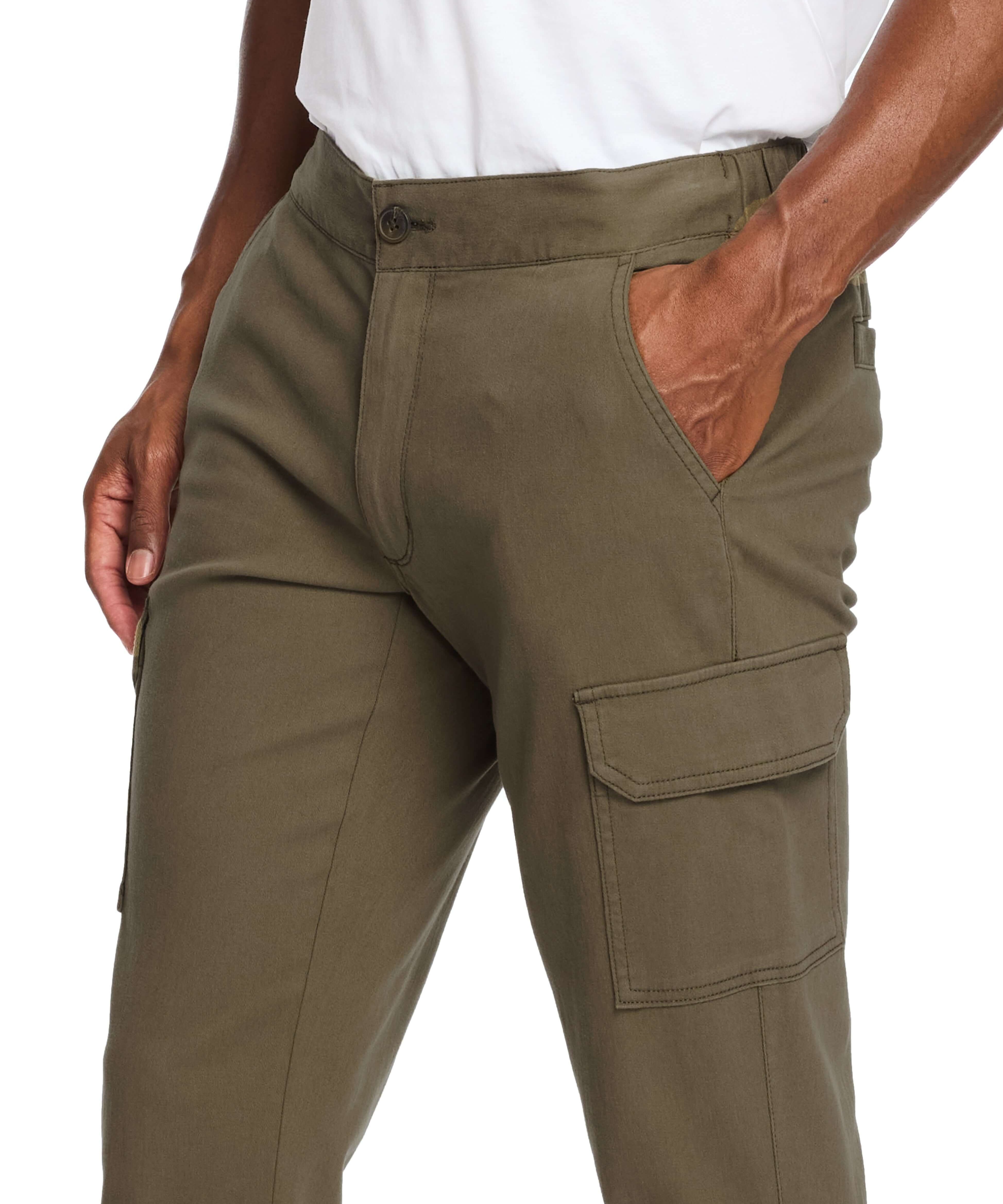 Cargo pants in dark olive with stretch waist and side slash pockets, designed for comfort and durability.