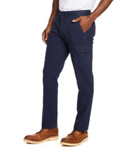 Navy cargo pants with a stretch waist, featuring side slash and cargo pockets, model wearing brown shoes.